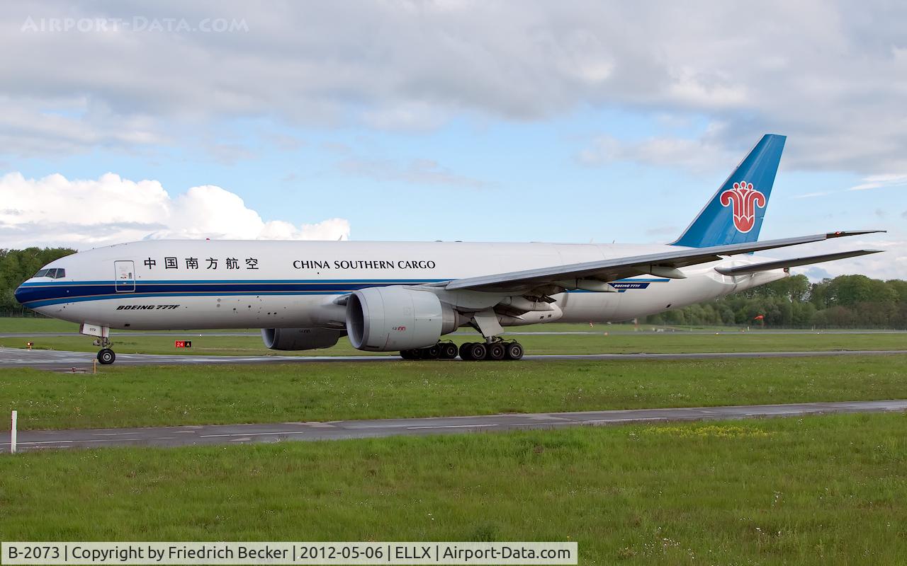 B-2073, 2009 Boeing 777-F1B C/N 37311, taxying to the holding point RW24