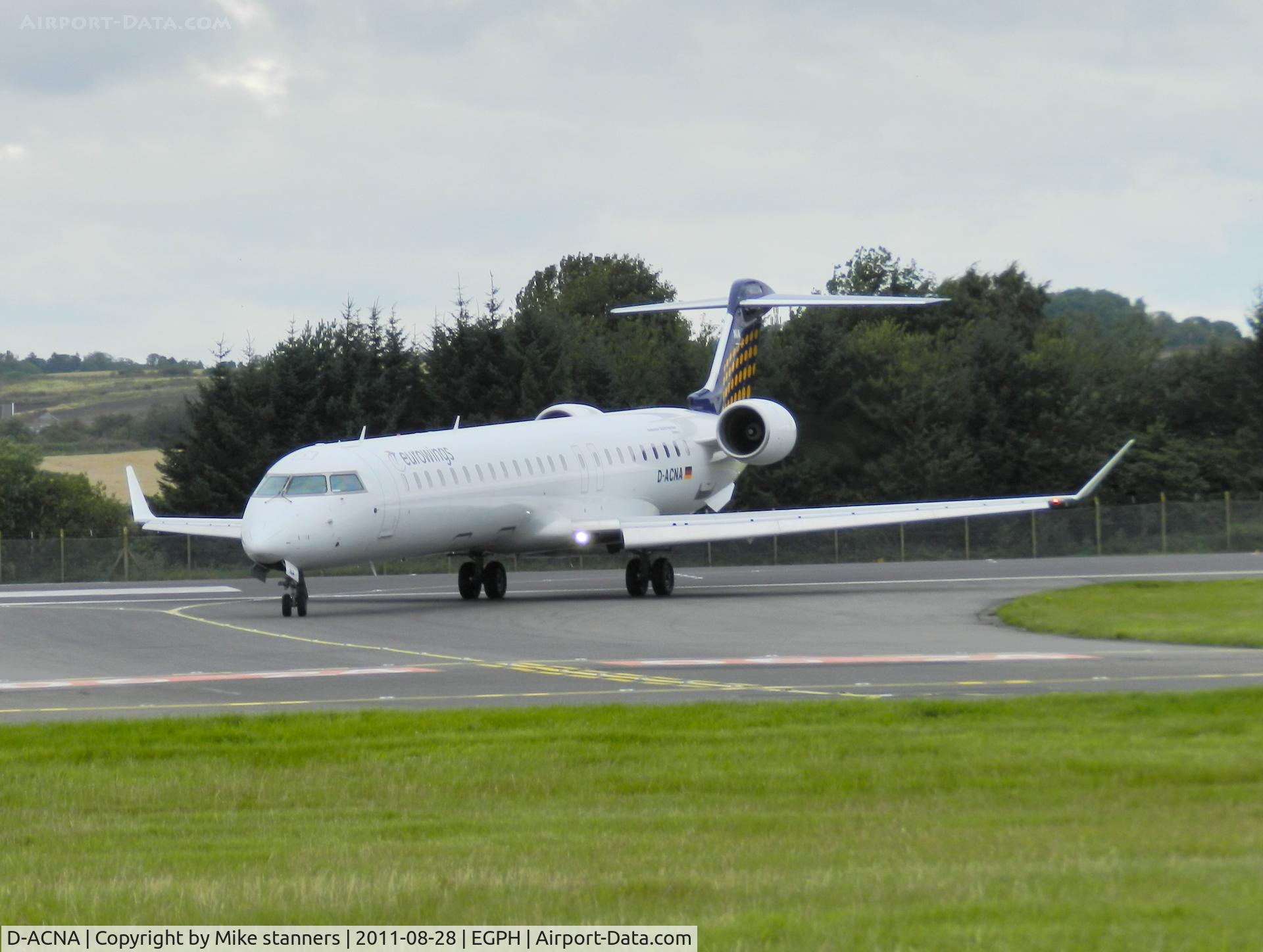 D-ACNA, 2009 Bombardier CRJ-900 NG (CL-600-2D24) C/N 15229, Eurowings CRJ900 Turning onto taxiway bravo 1
