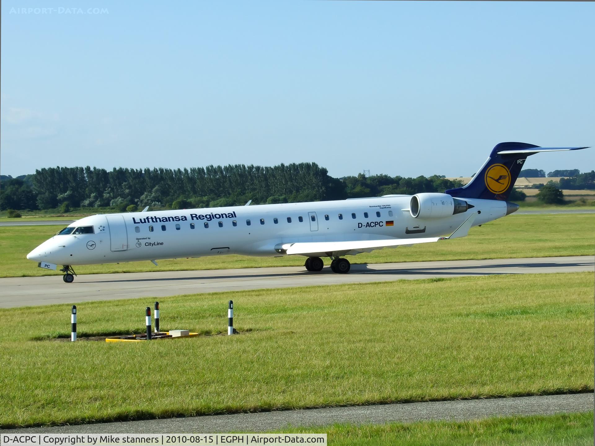 D-ACPC, 2001 Canadair CRJ-701ER (CL-600-2C10) Regional Jet C/N 10014, “Lufthansa 4949” Taxiing to runway 06 for departure to DUS