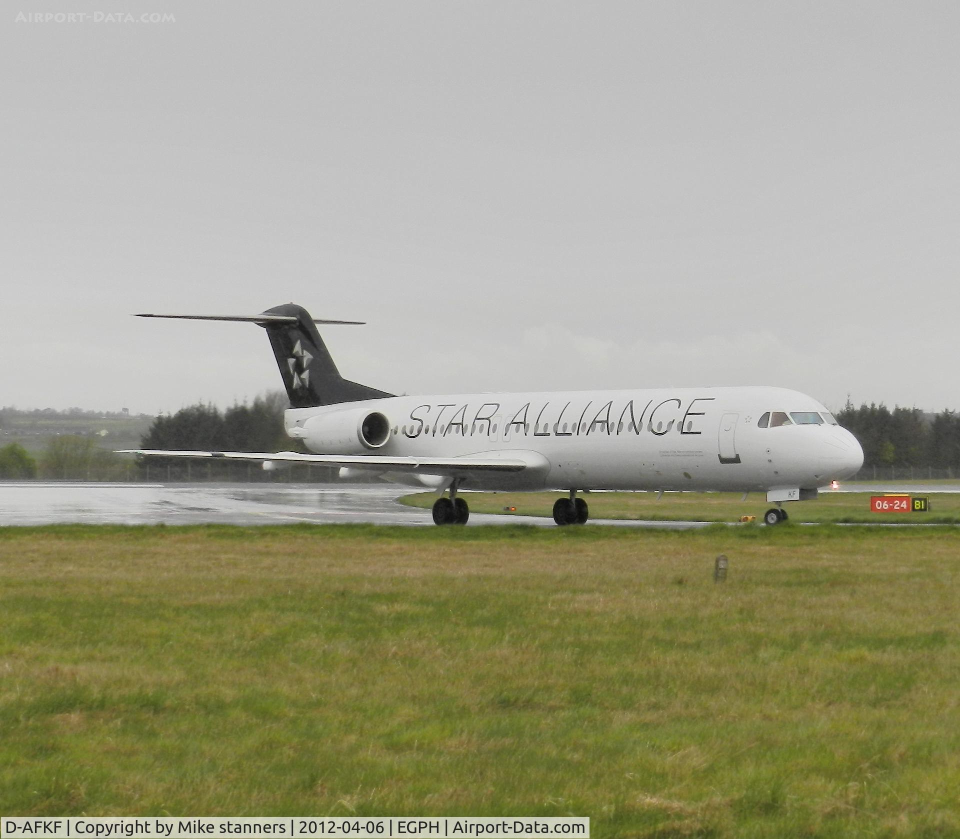 D-AFKF, 1994 Fokker 100 (F-28-0100) C/N 11470, “Lufthansa 7JV” arrives at a rain soaked EDI From DUS