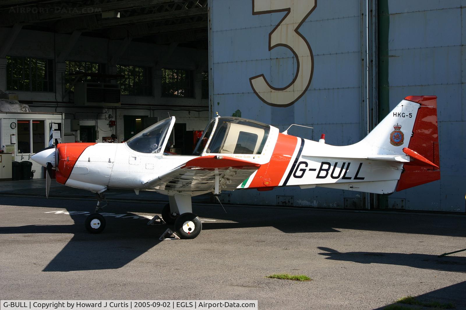 G-BULL, 1977 Scottish Aviation Bulldog Series 120 Model 128 C/N BH120/392, Wearing Hong Kong Government markings as HKG-5.