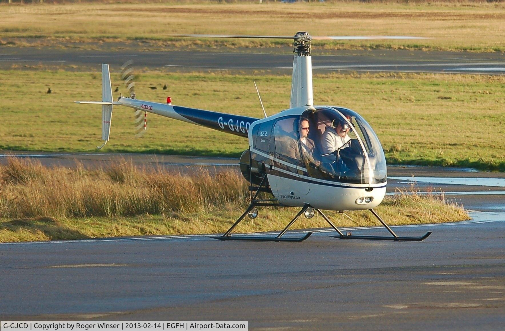 G-GJCD, 1989 Robinson R22 Beta C/N 0966, R22 Beta operating from Swansea Airport. On loan to Heli-air Wales whilst G-LINS is away from base.