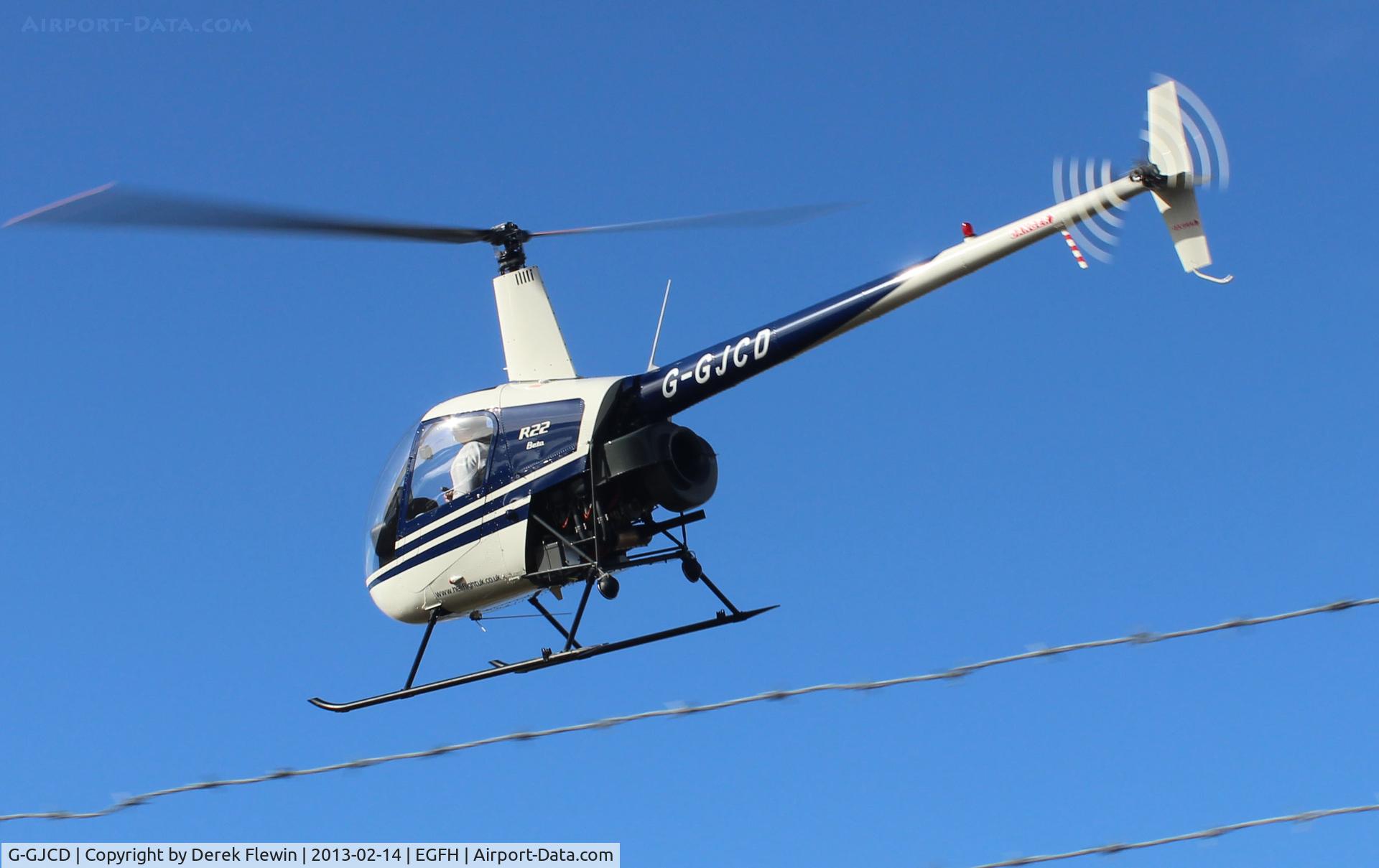G-GJCD, 1989 Robinson R22 Beta C/N 0966, Going to shut down after local training.