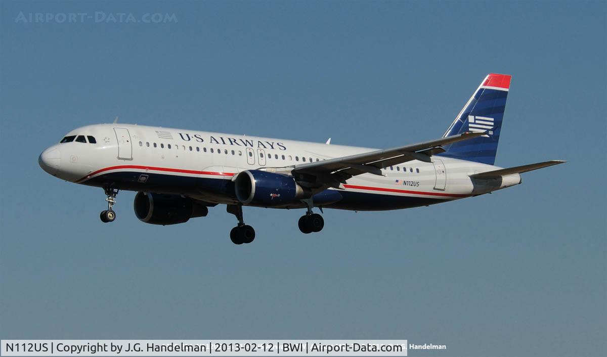 N112US, 1999 Airbus A320-214 C/N 1134, On final to 33L