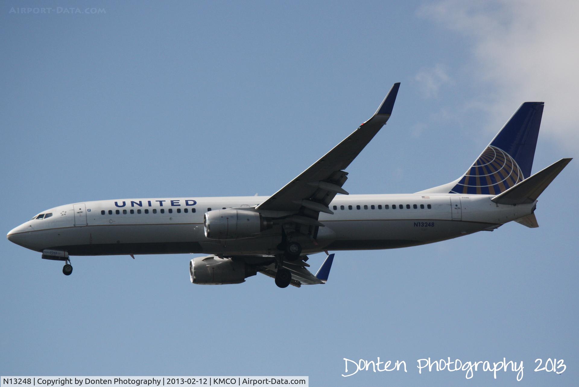N13248, 1999 Boeing 737-824 C/N 28808, United Flight 1176 (N13248) arrives at Orlando International Airport following a flight from Denver International Airport