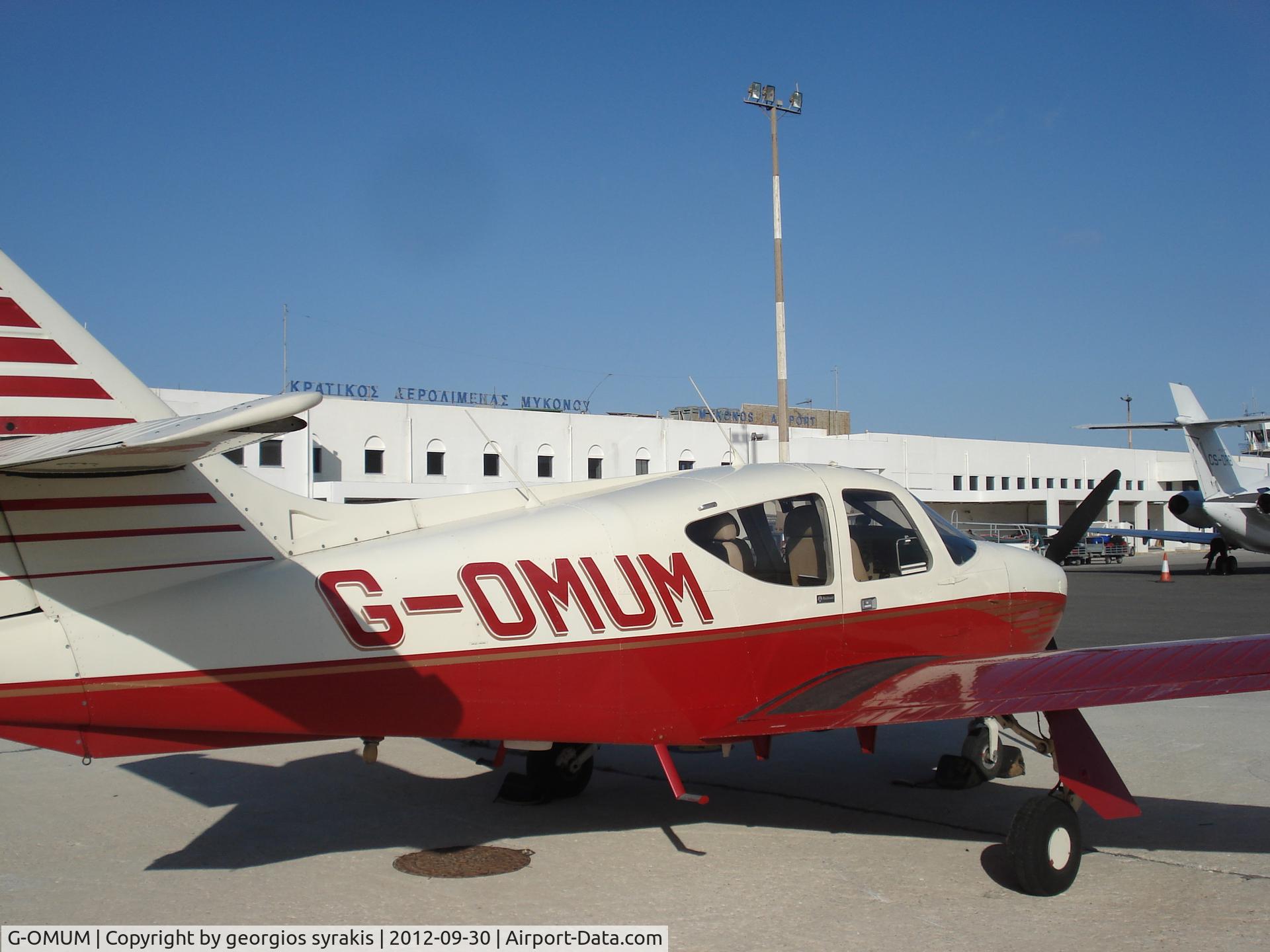 G-OMUM, 1976 Rockwell Commander 114 C/N 14067, mykonos airport 2012