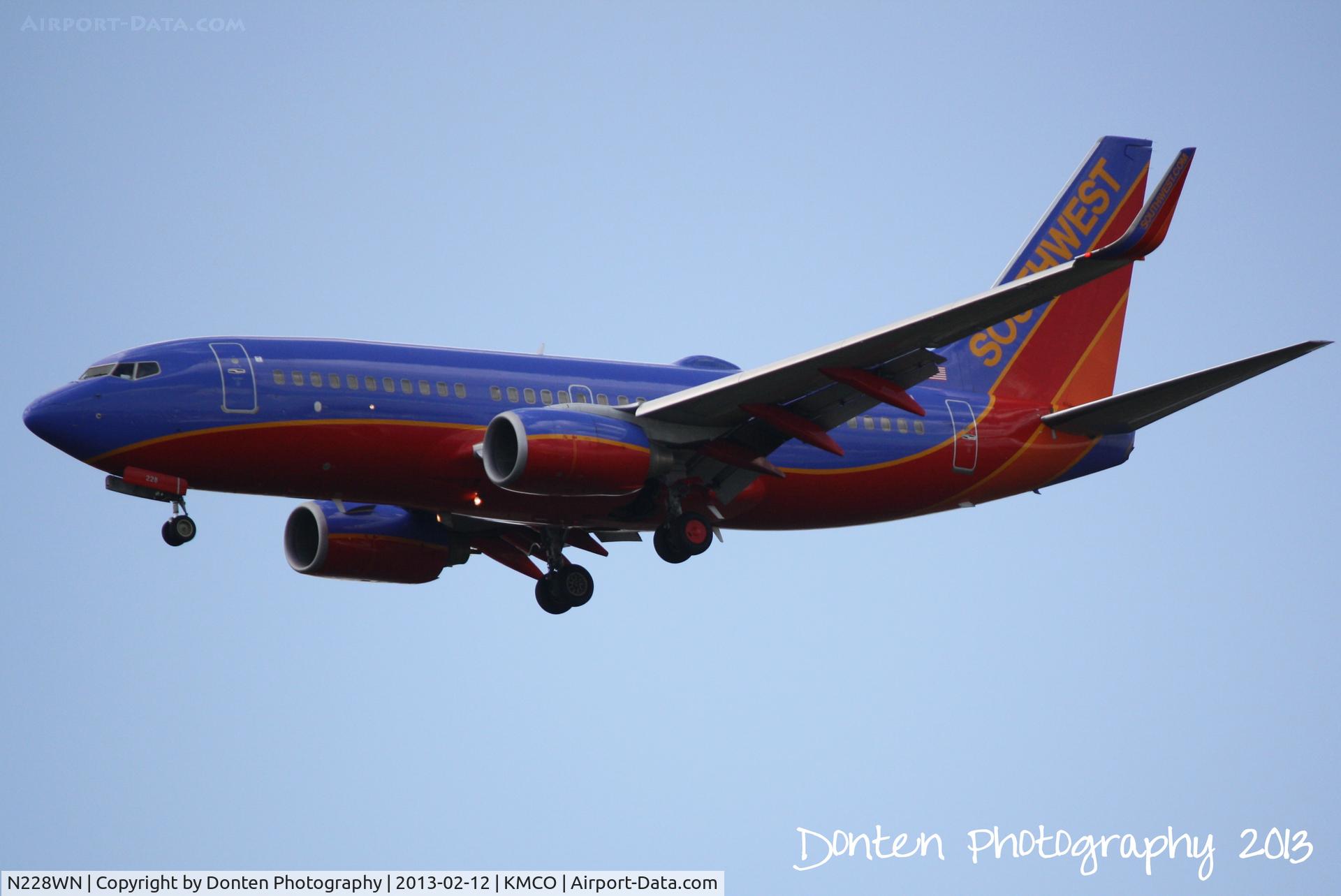 N228WN, 2005 Boeing 737-7H4 C/N 32496, Southwest Flight 8506 (N228WN) arrives at Orlando International Airport following a flight from Tampa International Airport