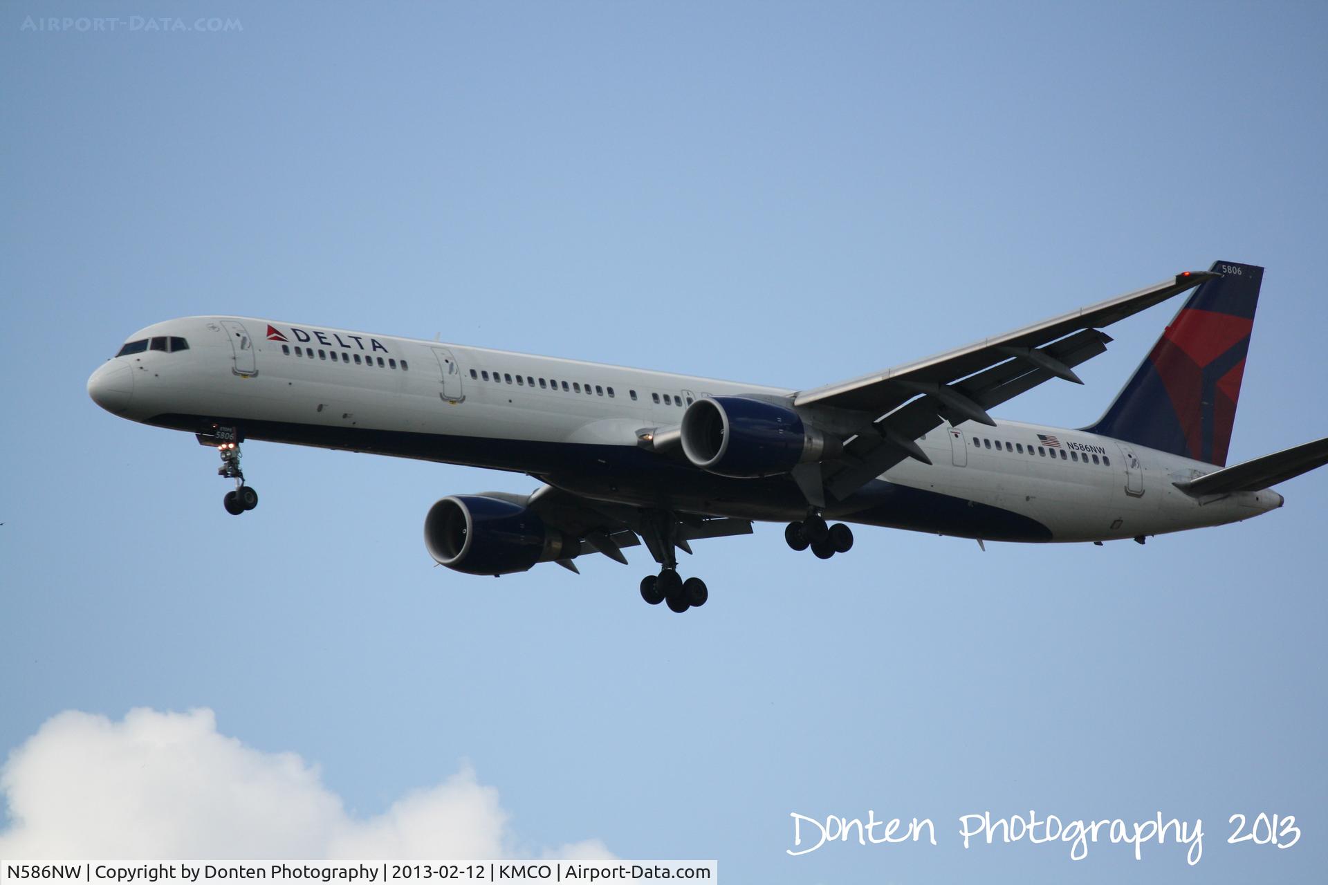 N586NW, 2002 Boeing 757-351 C/N 32987, Delta Flight 1979 (N586NW) arrives at Orlando International Airport following a flight from Minneapolis/St Paul International Airport