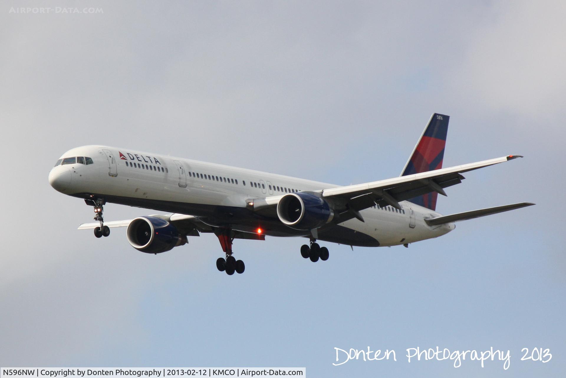 N596NW, 2003 Boeing 757-351 C/N 32996, Delta Flight 1117 (N596NW) arrives at Orlando International Airport following a flight from Detroit Metro-Wayne County Airport