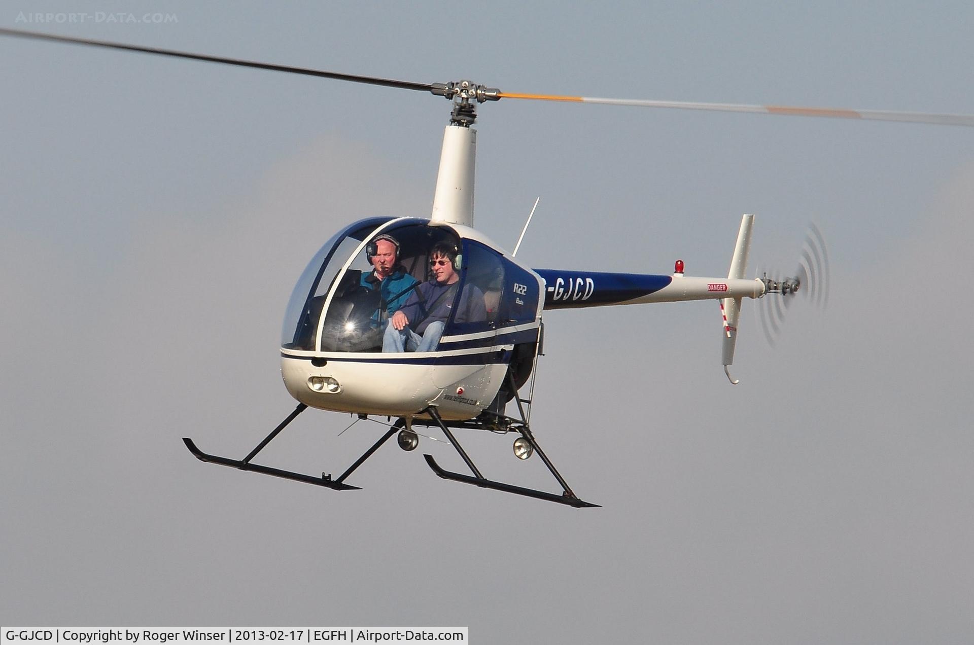 G-GJCD, 1989 Robinson R22 Beta C/N 0966, R22 Beta operating from Swansea Airport. On loan to Heli-air Wales whilst G-LINS is away from base.