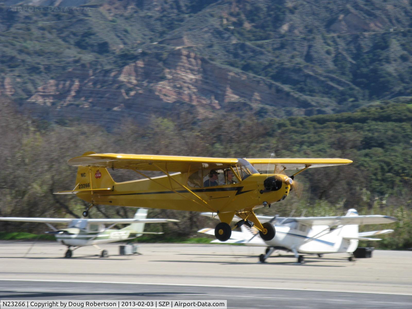 N23266, 1939 Piper J3C-65 Cub Cub C/N 3113, 1939 Piper J3C-65 CUB, Continental A&C65 65 Hp, takeoff climb Rwy 22