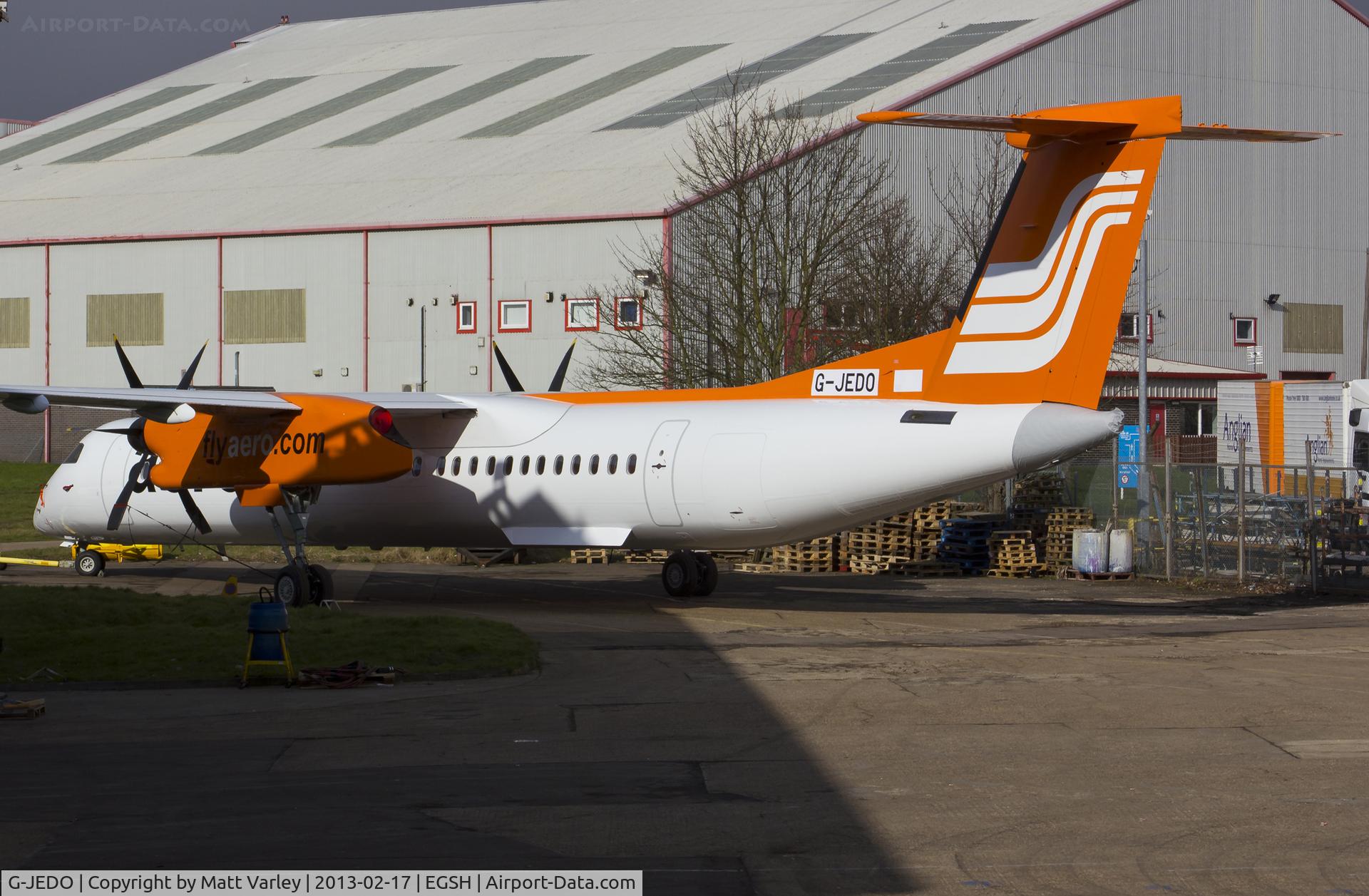 G-JEDO, 2003 De Havilland Canada DHC-8-402Q Dash 8 C/N 4079, Fresh out of spray in AeroContractor's C/S.