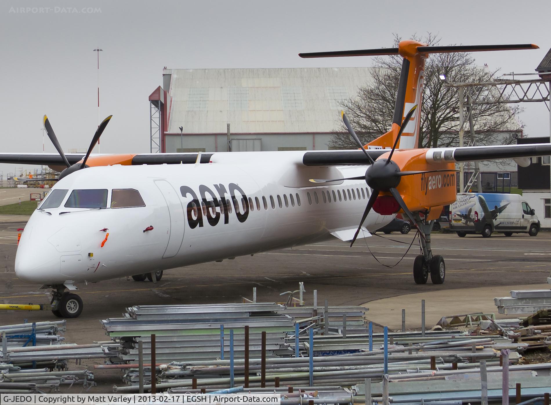 G-JEDO, 2003 De Havilland Canada DHC-8-402Q Dash 8 C/N 4079, Fresh out of spray in AeroContractor's C/S.