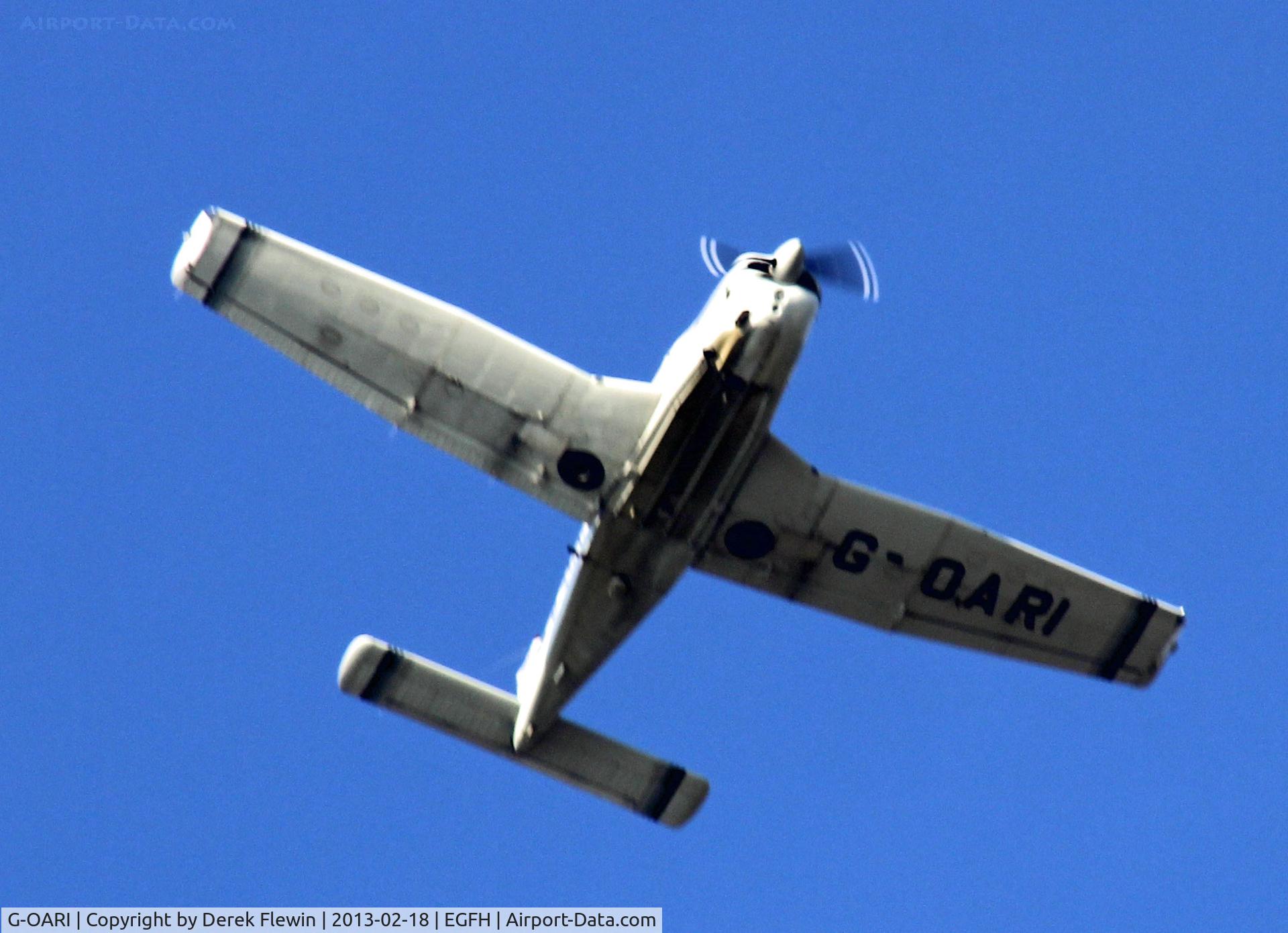 G-OARI, 1988 Piper PA-28R-201 Cherokee Arrow III C/N 2837005, High fly by prior to landing.