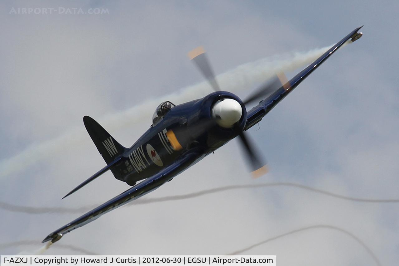 F-AZXJ, 1949 Hawker Sea Fury FB.11 C/N 37733, At Flying Legends 2012. Painted in Royal Australian Navy colours as 'WH589', Notice the smoke from the Smokewinders behind and the flame from the exhaust. Beautiful aeroplane, wonderful sight and sound.