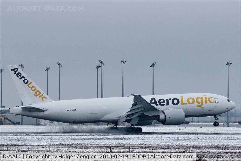 D-AALC, 2009 Boeing 777-FZN C/N 36003, Touch down on snow wet rwy 26L......