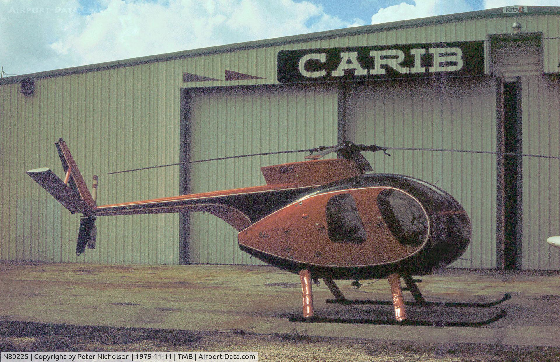 N80225, Hughes 369HS C/N 860857S, Hughes 369HS as seen at New Tamiami in November 1979.