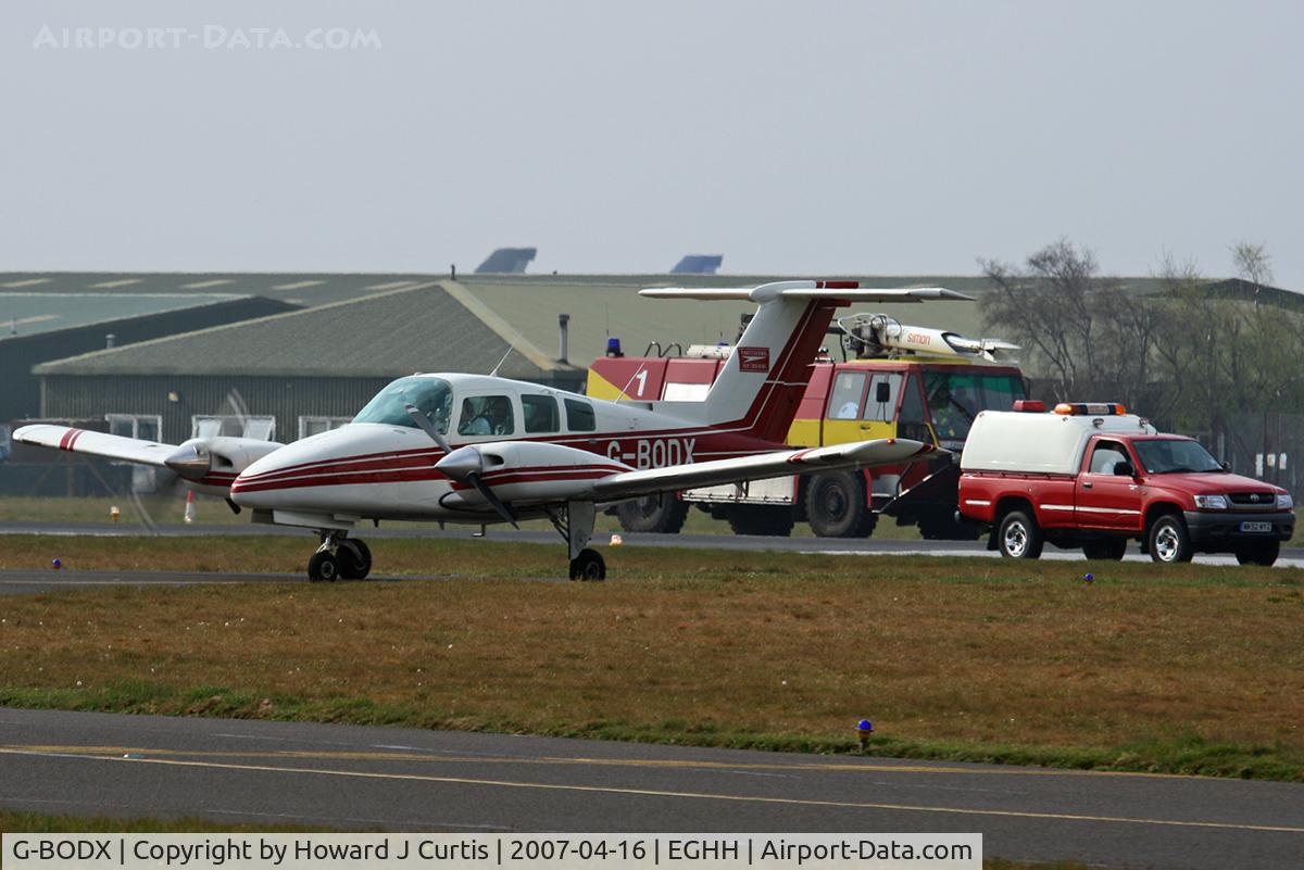 G-BODX, 1979 Beech 76 Duchess C/N ME-309, Professional Air Training. Met by the emergency services as one engine was shut down - notice the feathered prop.