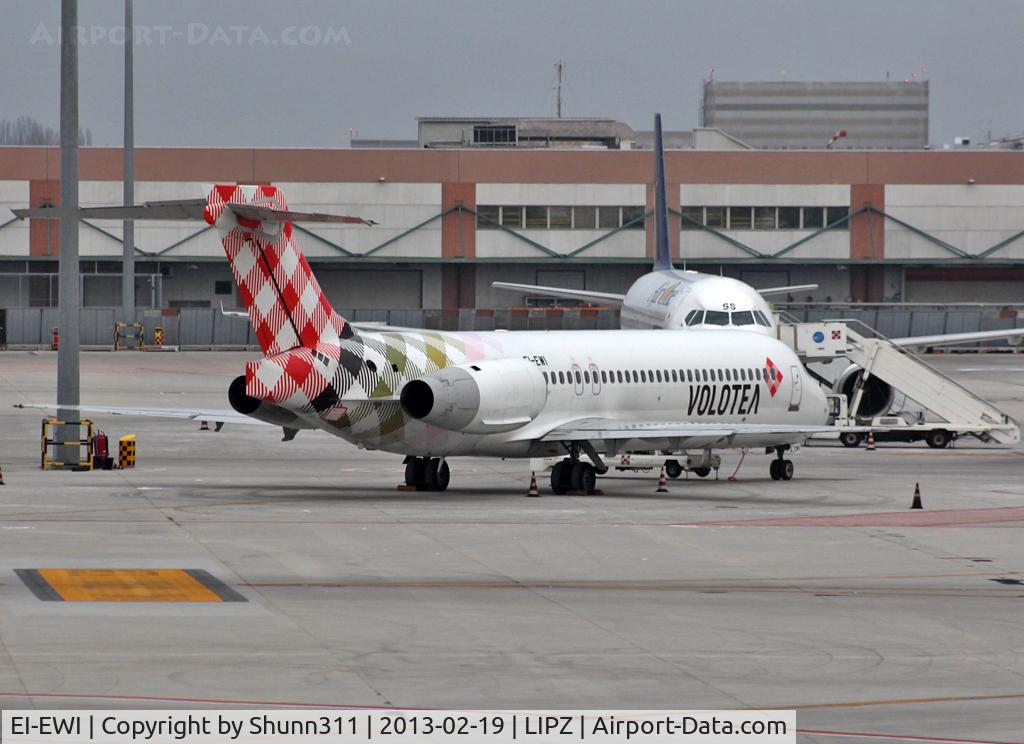 EI-EWI, 2003 Boeing 717-2BL C/N 55170, Parked at the Terminal...