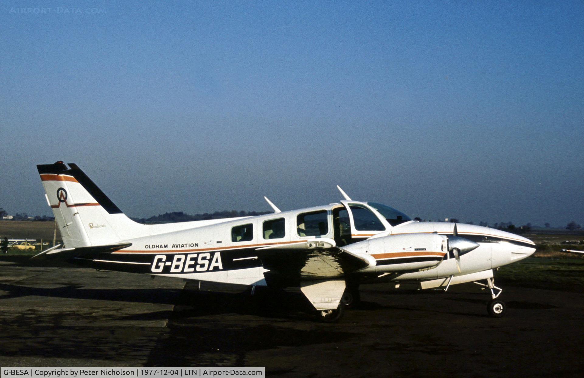 G-BESA, 1973 Beech 58 Baron C/N TH-406, Beech 58 Baron of Oldham Aviation as seen at Luton in December 1977.