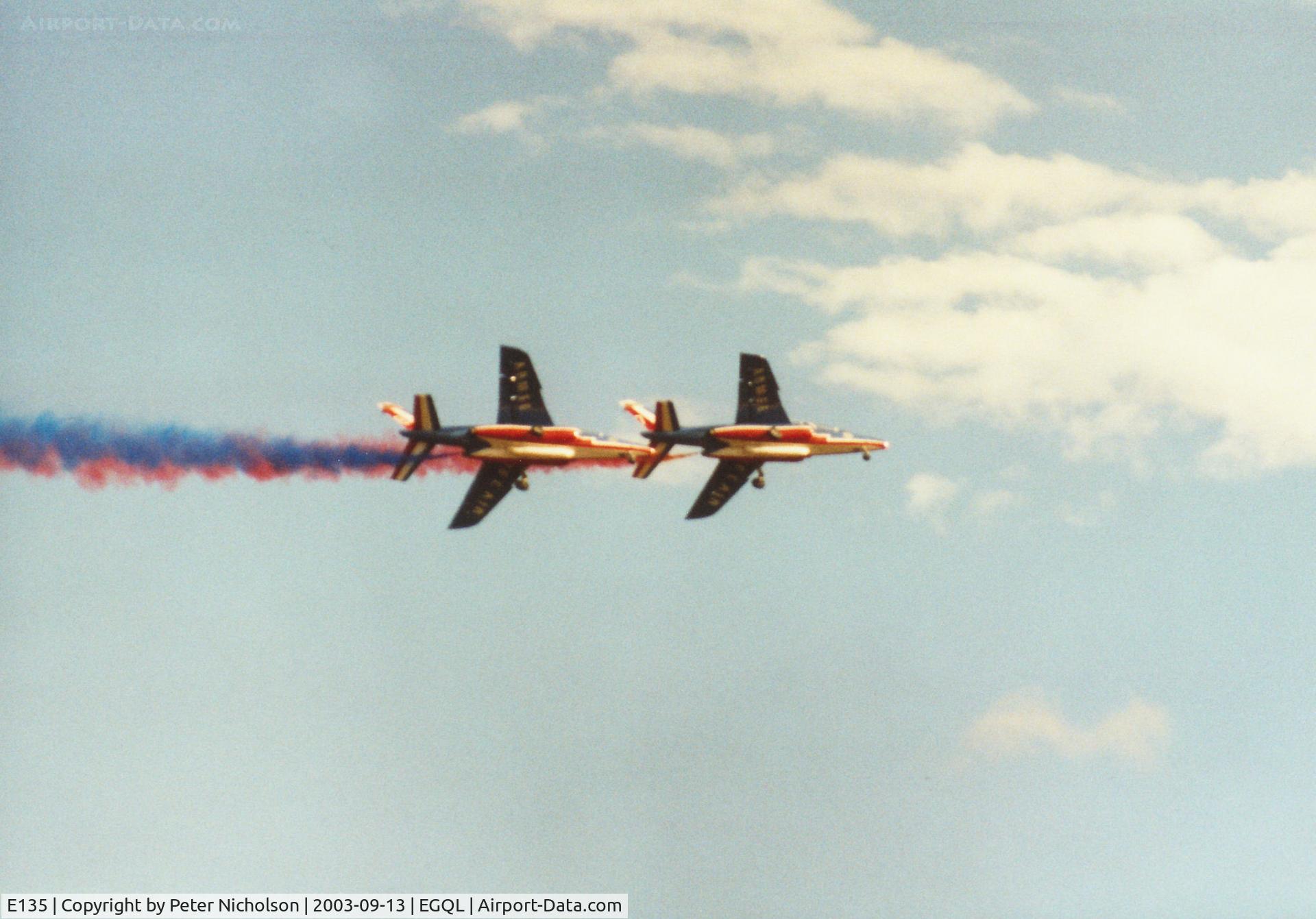 E135, Dassault-Dornier Alpha Jet E C/N E135, Alpha Jet E number 7 of the Patrouille de France aerobatic team leading a fly-past at the 2003 RAF Leuchars Airshow.