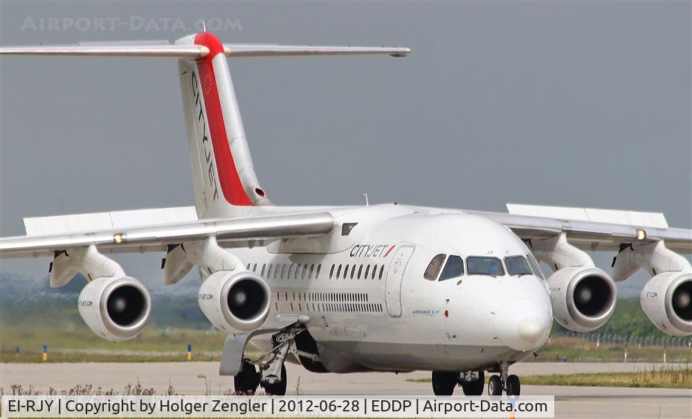 EI-RJY, 1997 British Aerospace Avro 146-RJ85 C/N E.2307, Like a big white bug aircraft is crawling along taxiway.....