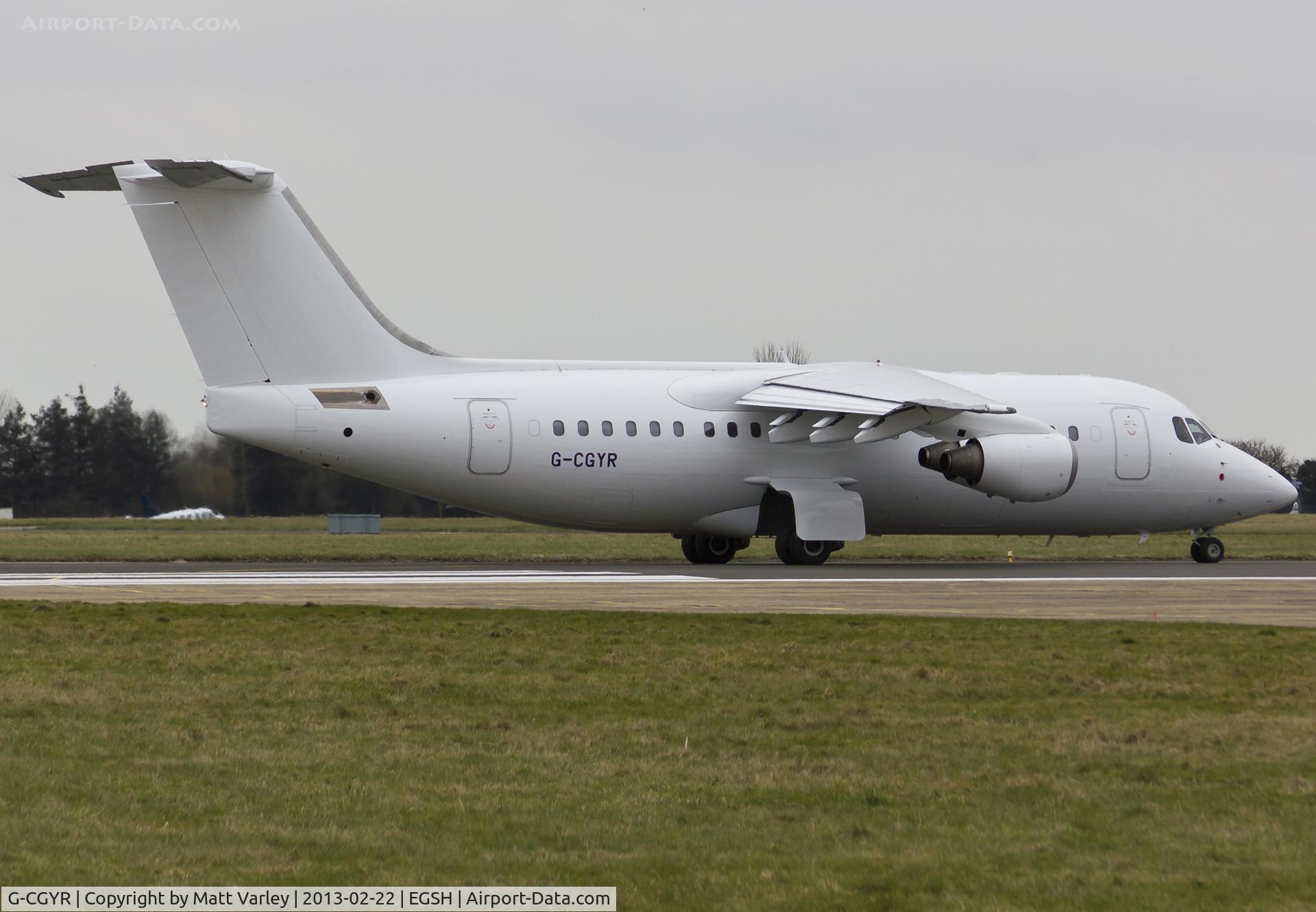 G-CGYR, 1995 British Aerospace Avro 146-RJ85 C/N E.2273, Departing EGSH after spray into a basic Cello livery.
