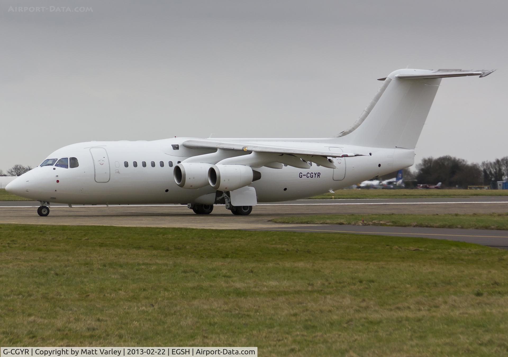 G-CGYR, 1995 British Aerospace Avro 146-RJ85 C/N E.2273, Departing EGSH after spray into a basic Cello livery.