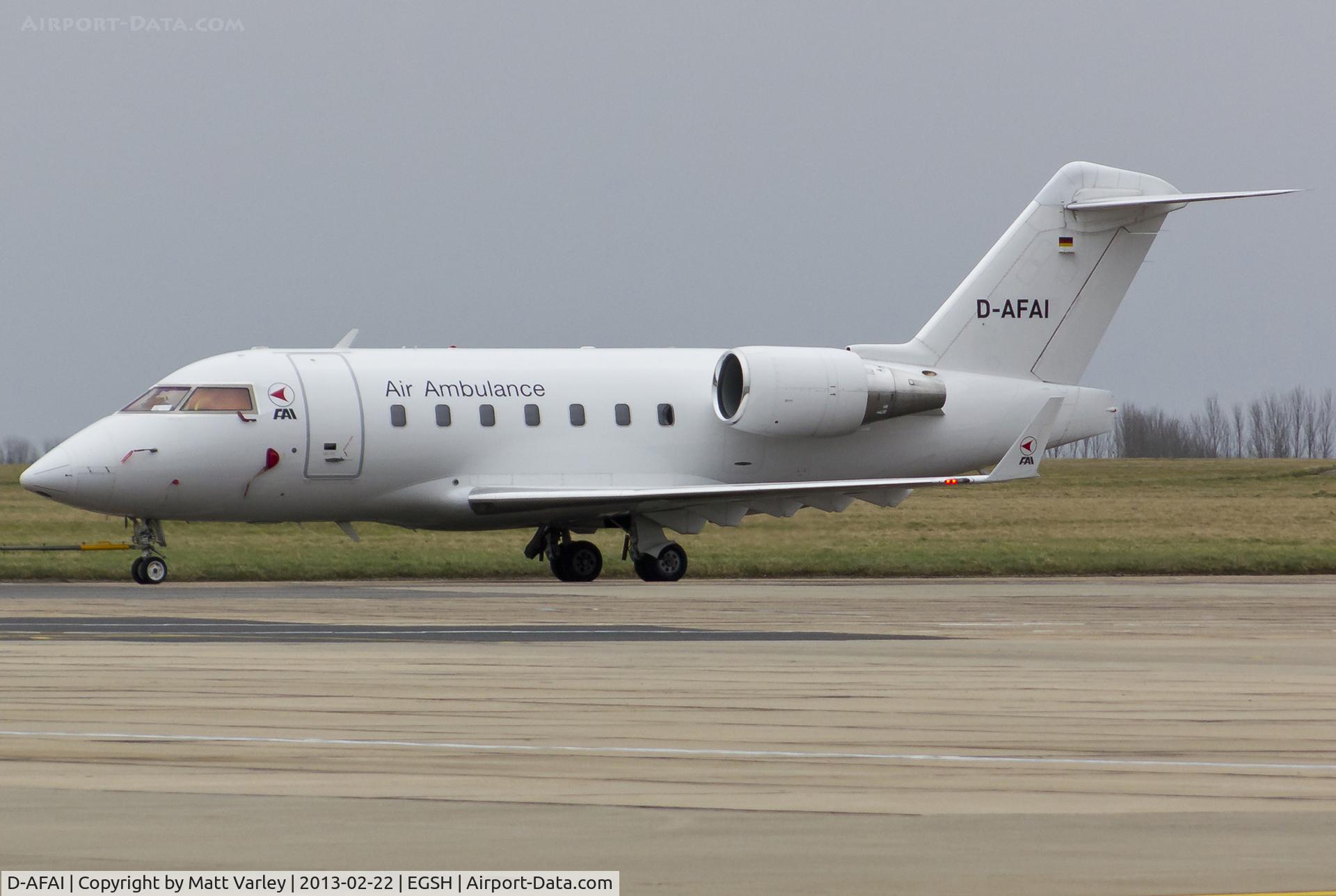 D-AFAI, 1998 Bombardier Challenger 604 (CL-600-2B16) C/N 5366, Being towed to the Air Livery hangar for spray.