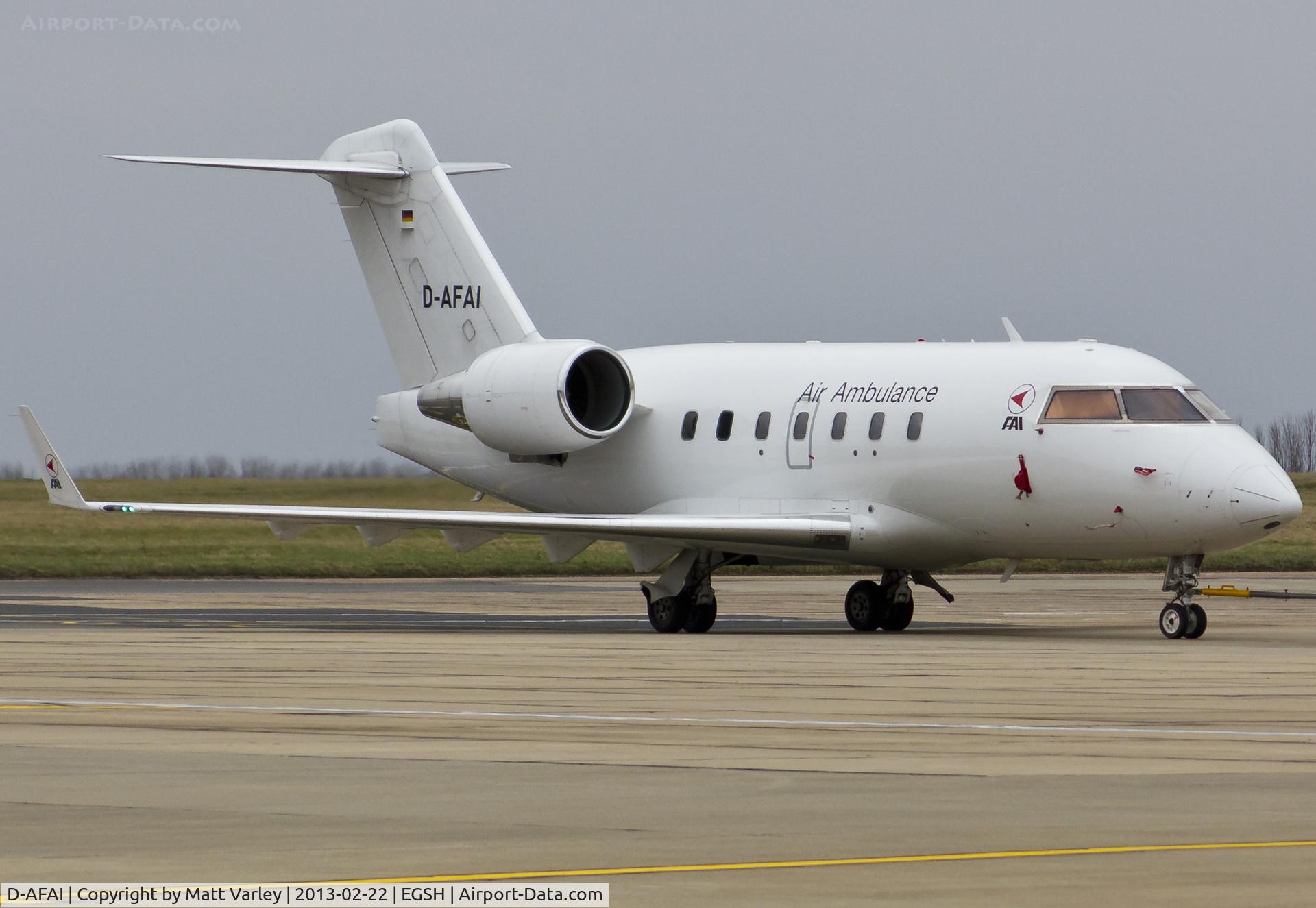D-AFAI, 1998 Bombardier Challenger 604 (CL-600-2B16) C/N 5366, Being towed to the Air Livery hangar for spray.