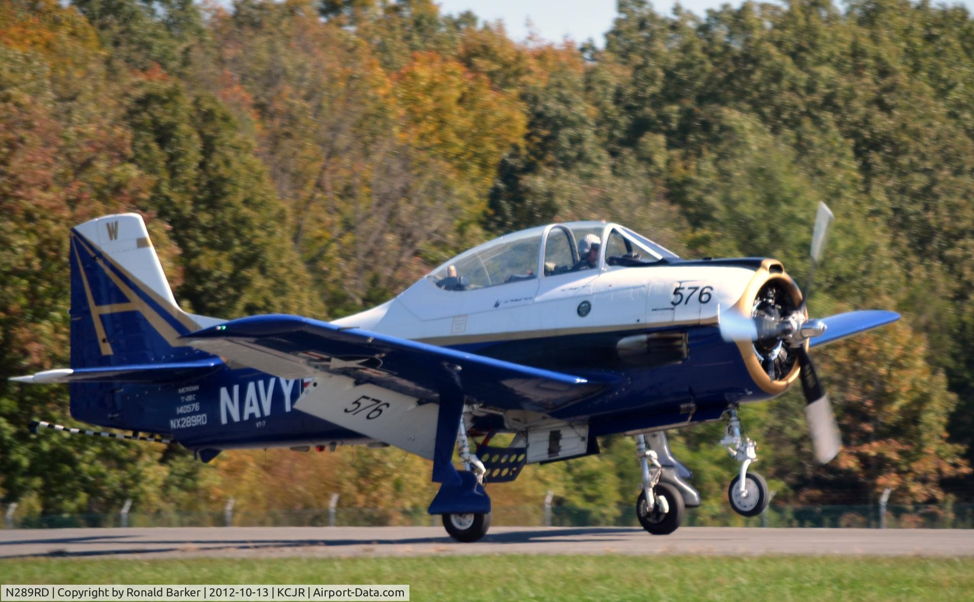 N289RD, 1956 North American T-28C Trojan C/N 226-153, Landing touchdown, nose wheel still up - Culpeper Air Fest 2012