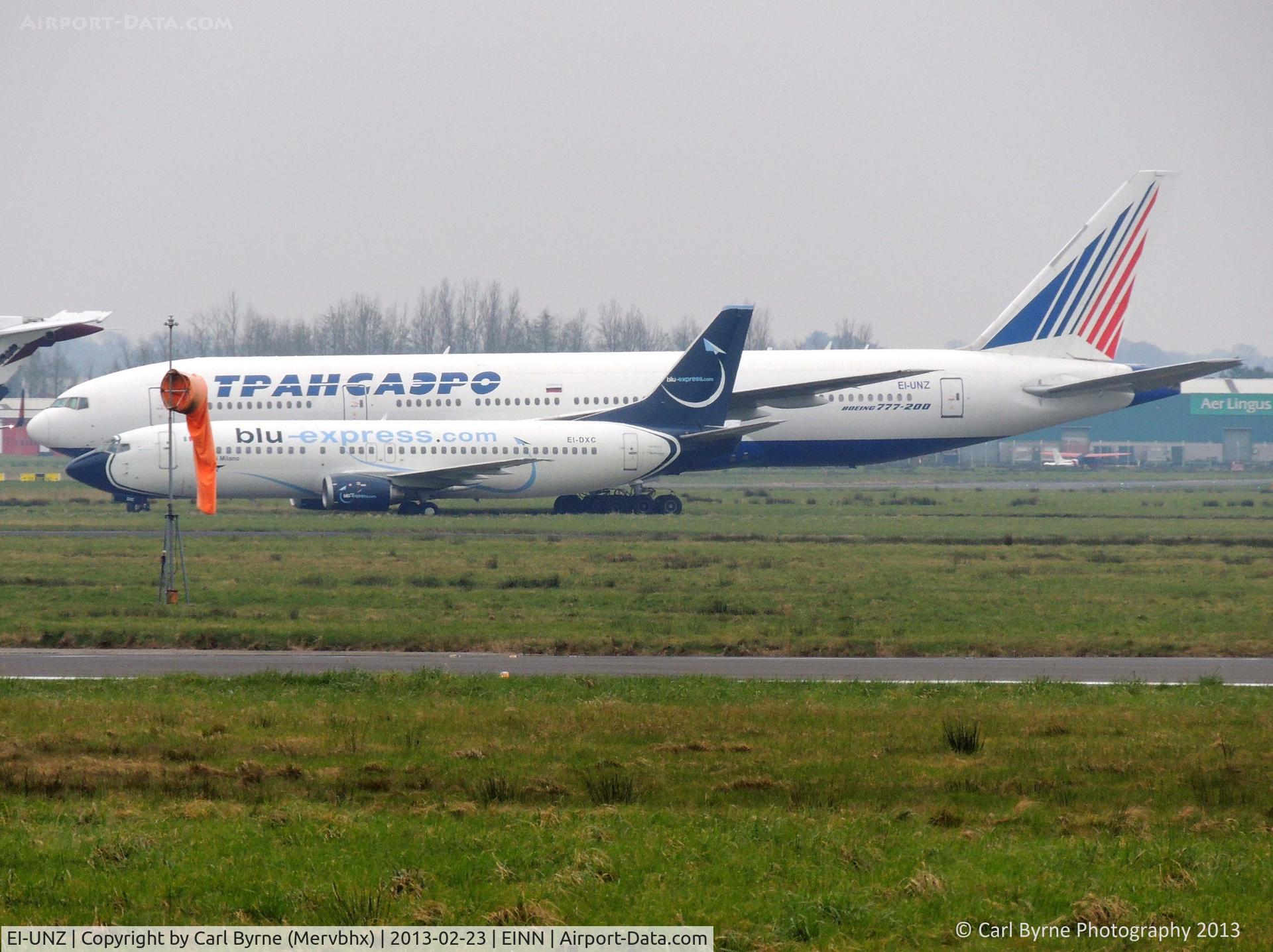 EI-UNZ, 1995 Boeing 777-222 C/N 26925, Stored in the centre of the airfield.