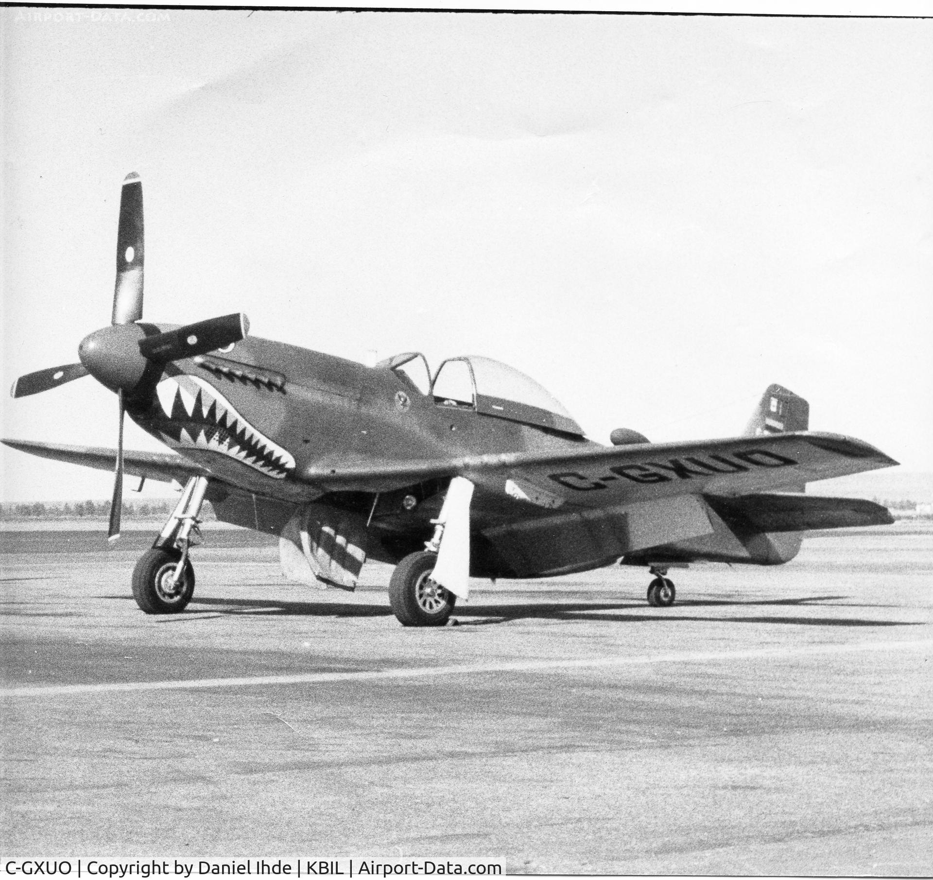 C-GXUO, 1944 North American P-51D Mustang C/N 122-31533, P-51D stopping at KBIL in the summer of 1982 or 1983.