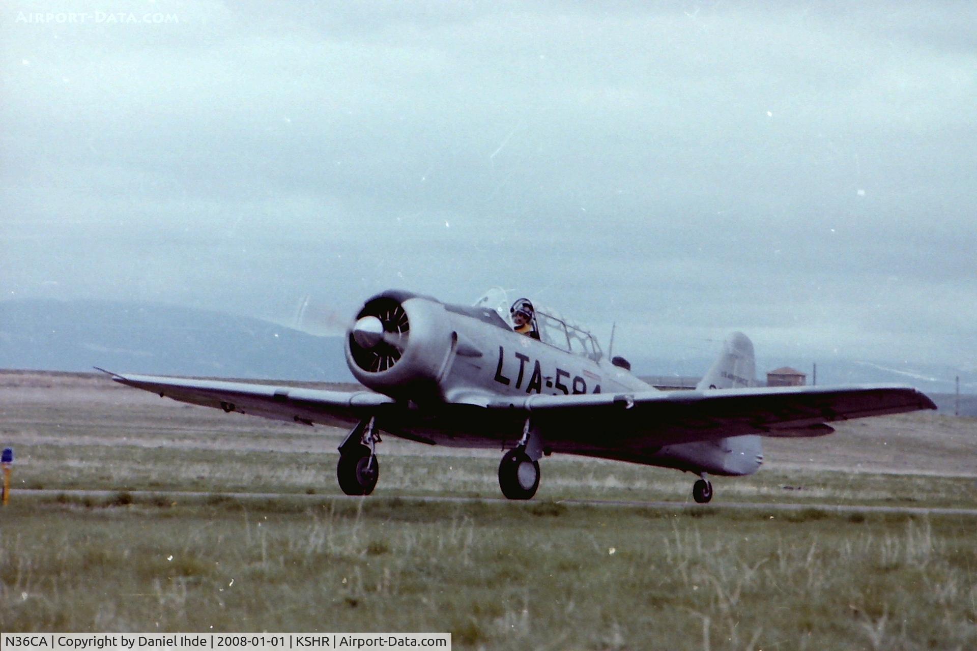 N36CA, North American AT-6D Texan C/N 88-10677, T-6 Texan LTA-584 at KSHR about 1982.