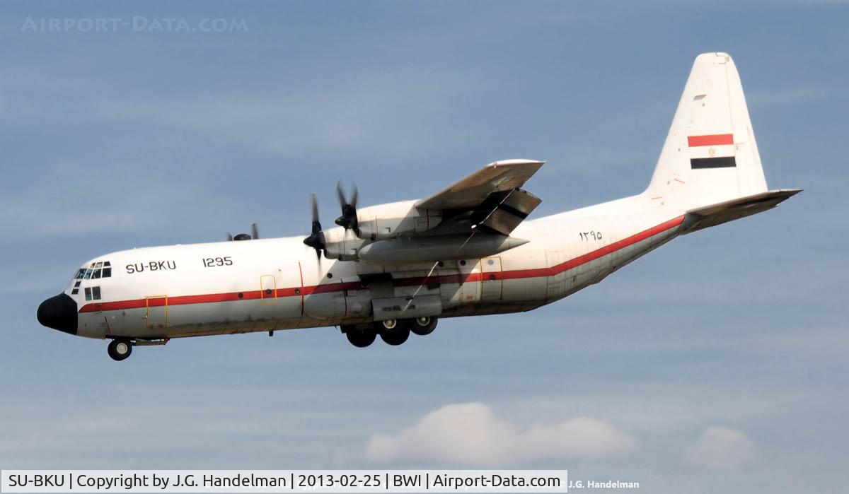 SU-BKU, 1989 Lockheed C-130H Hercules C/N 382-5206, on final to 33L