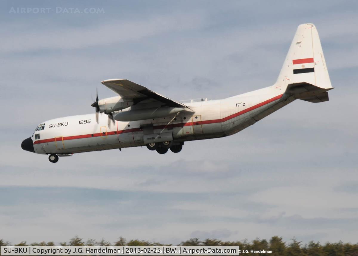 SU-BKU, 1989 Lockheed C-130H Hercules C/N 382-5206, on final to 33L