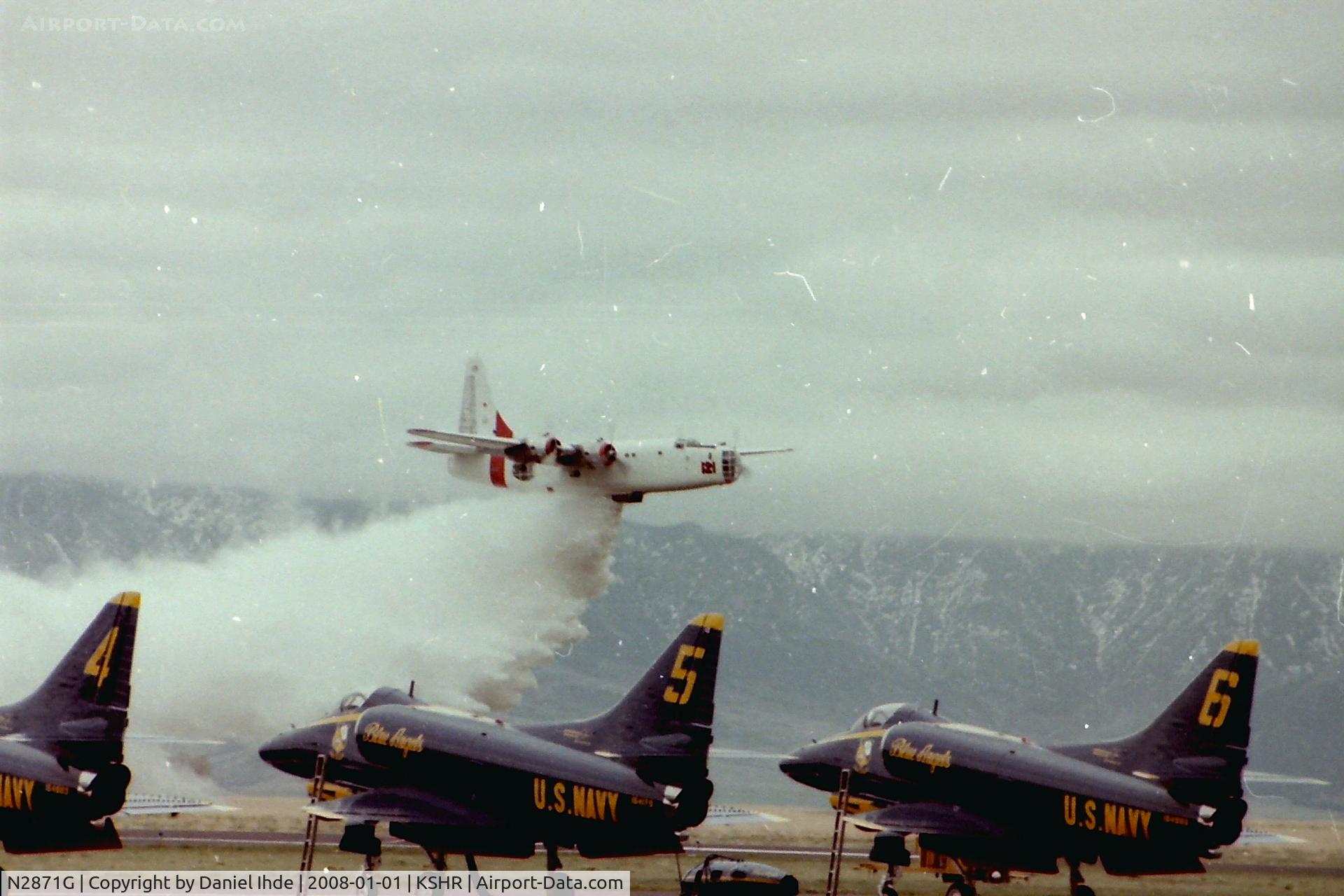 N2871G, Consolidated Vultee P4Y-2 Privateer C/N 66302, Hawkins & Powers tanker 121 demonstrating an air drop at KSHR around 1983.