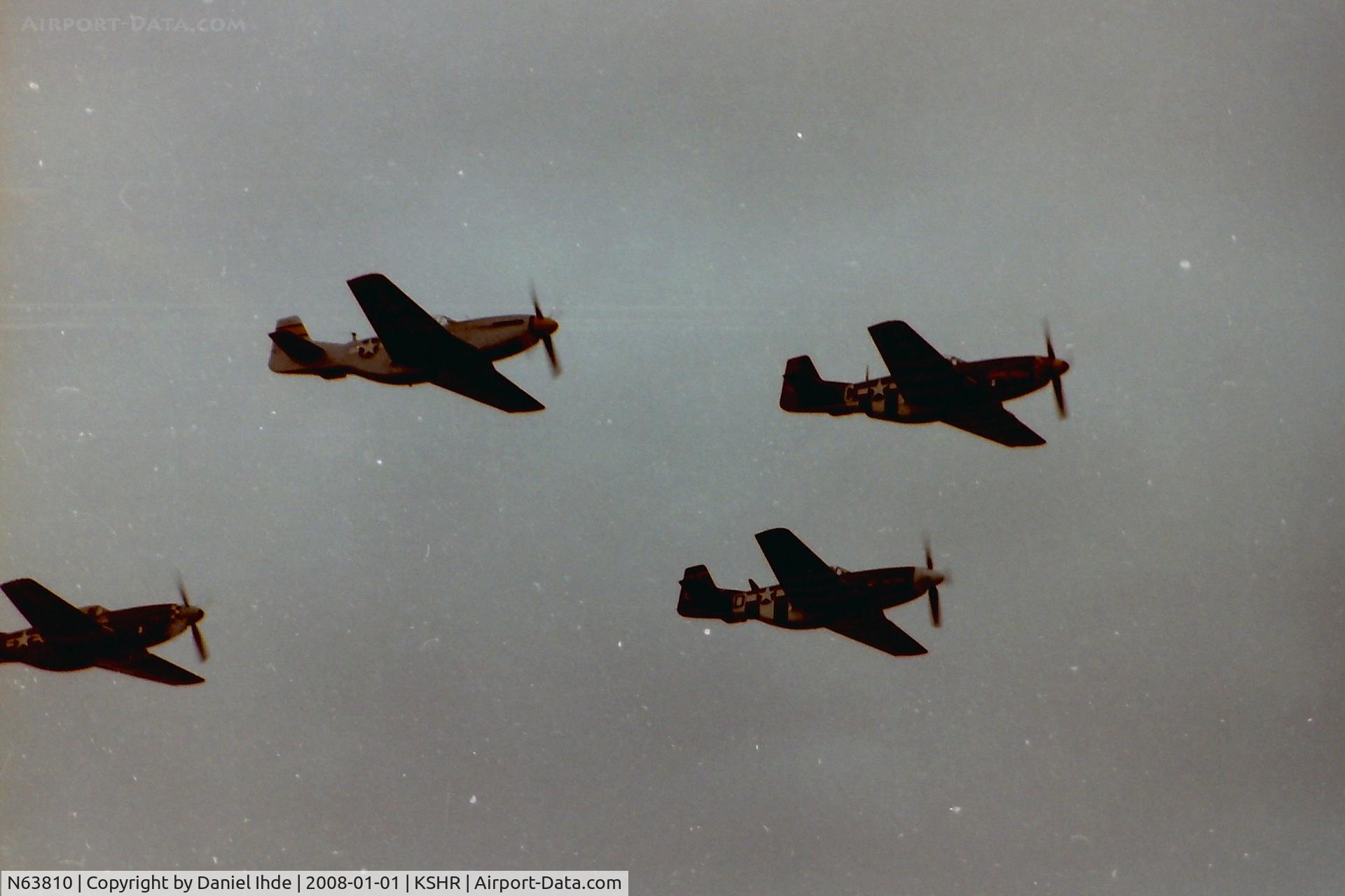 N63810, 1945 North American P-51D Mustang C/N 45-11367, N63810 along with additional P-51's in formation at KSHR around 1983.