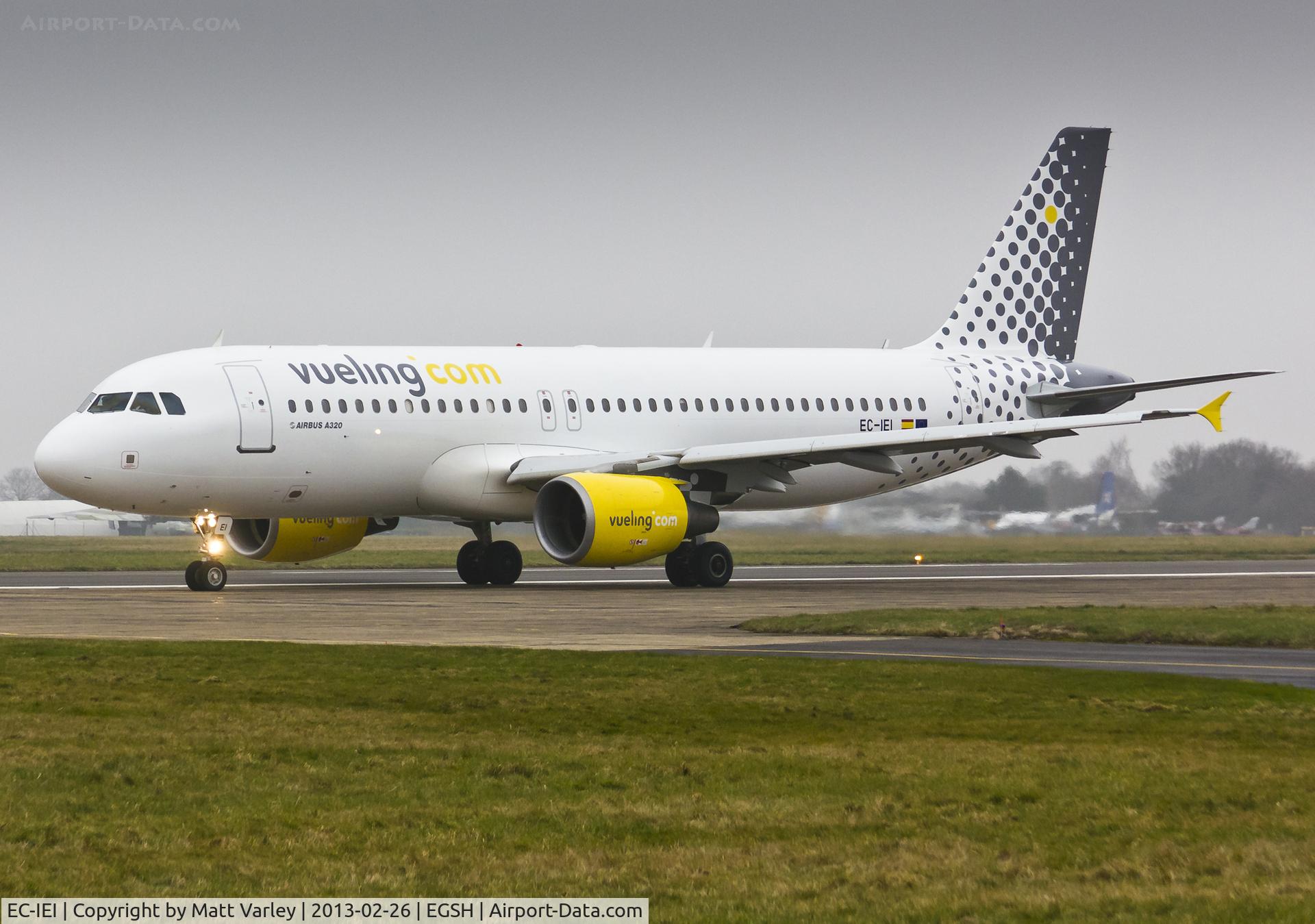 EC-IEI, 2001 Airbus A320-214 C/N 1694, Departing EGSH after spray into Vueling C/S.