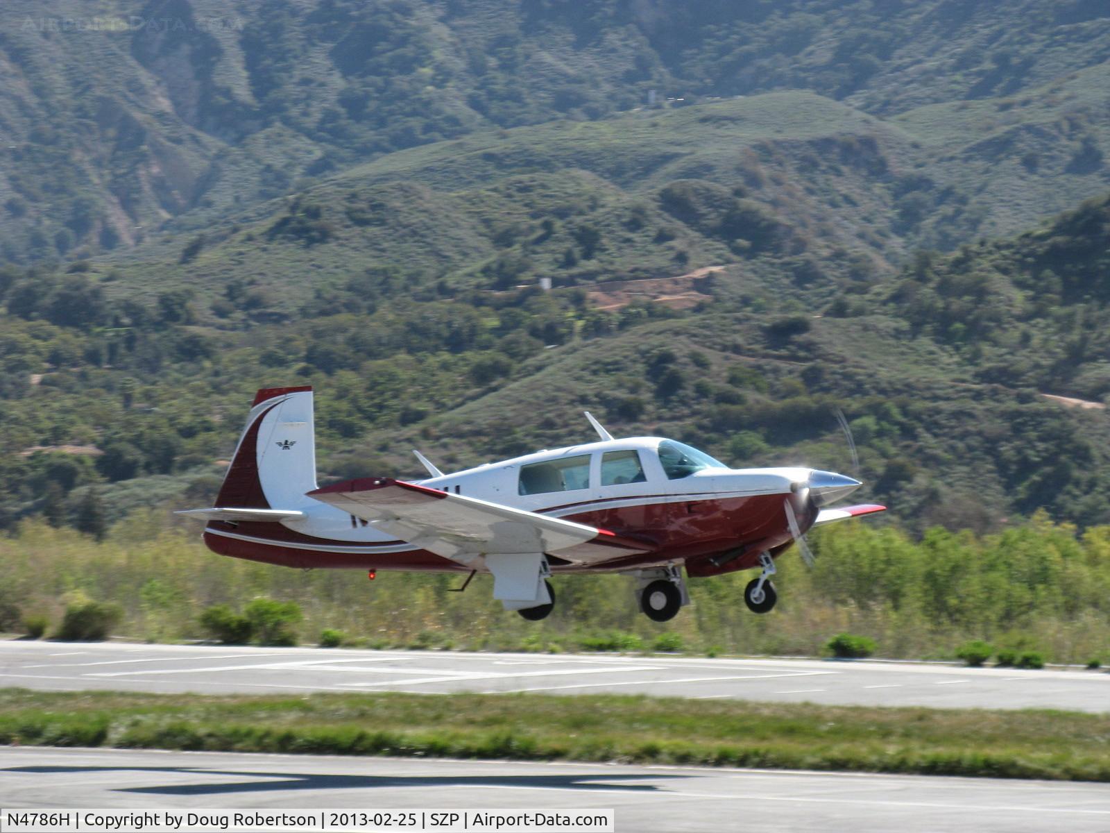 N4786H, 1979 Mooney M20J 201 C/N 24-0876, 1979 Mooney M20J 201, Lycoming IO-360- A&C 200 Hp, stunning refinish, takeoff climb Rwy 22