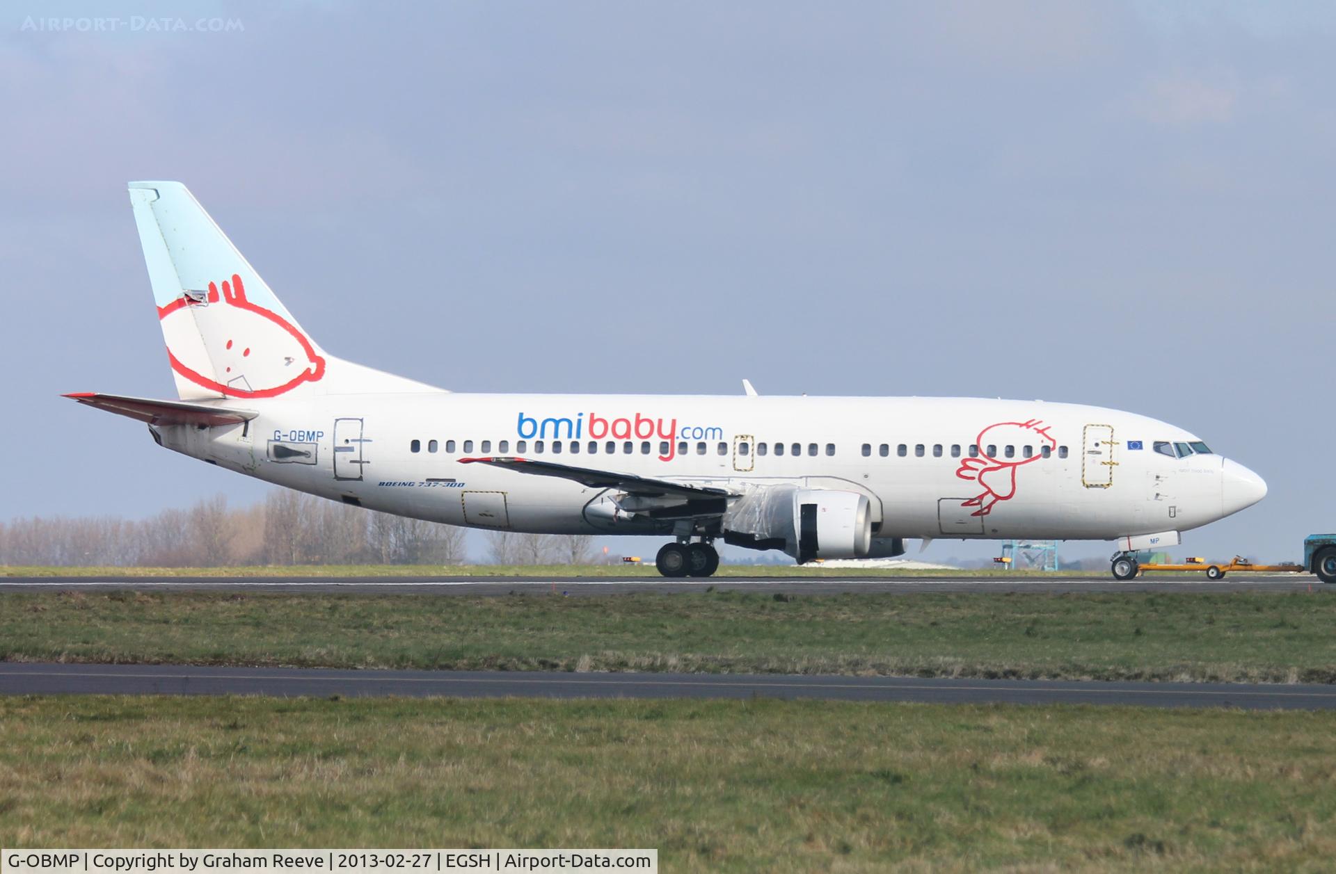 G-OBMP, 1992 Boeing 737-3Q8 C/N 24963, Under tow with engines covered in plastic.