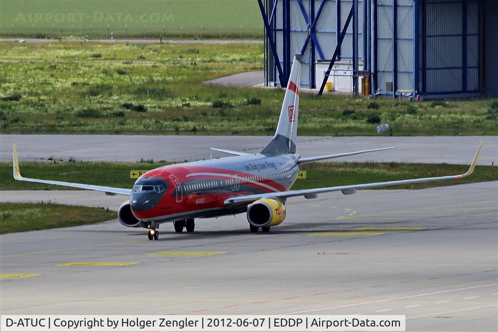 D-ATUC, 2006 Boeing 737-8K5 C/N 34684, A train is coming along on airport´s apron? Sure, it´s TUIfly with one of its wonderbirds.