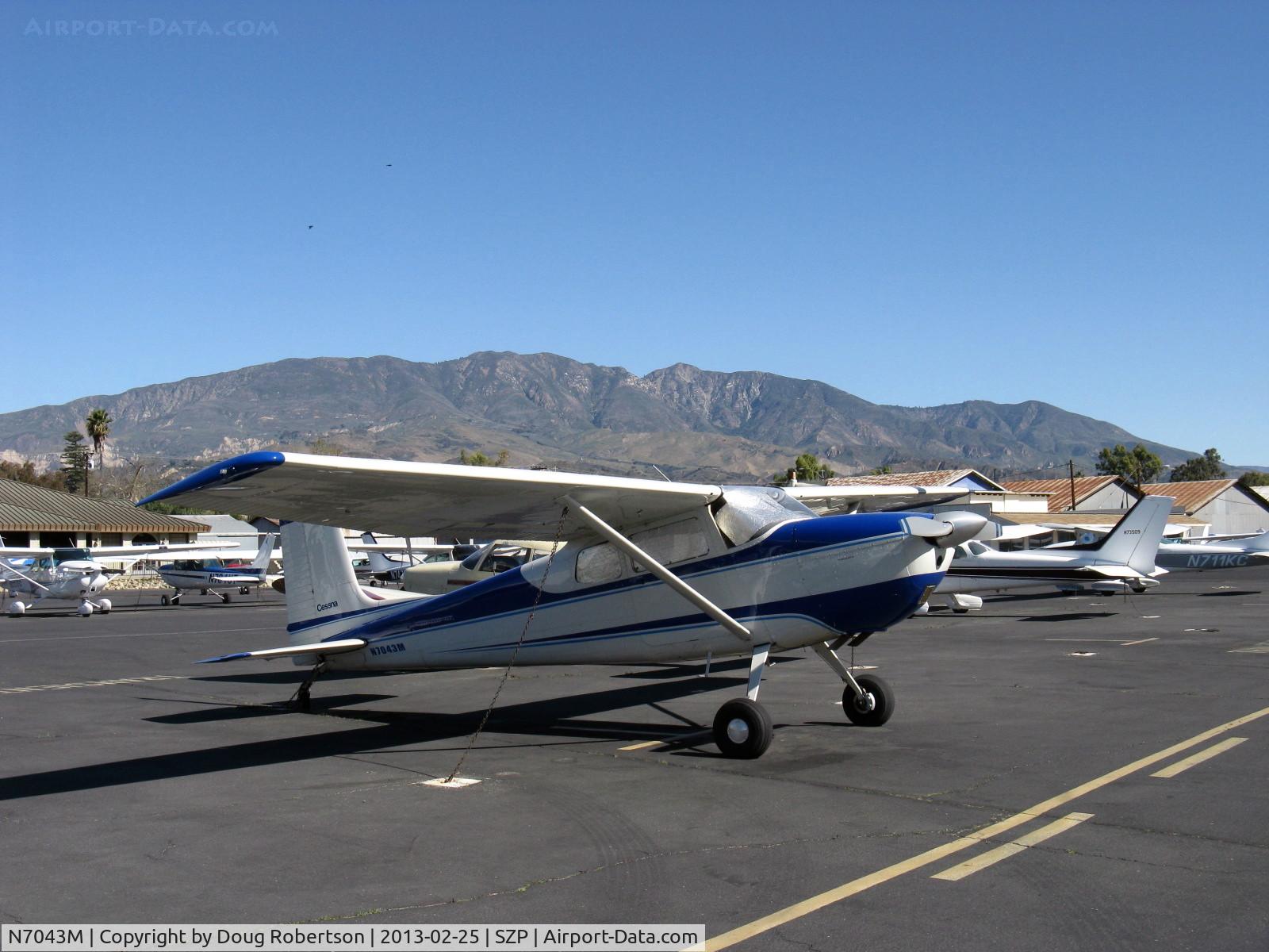 N7043M, 1958 Cessna 175 Skylark C/N 55343, 1958 Cessna 175 SKYLARK, Franklin 6A&6V335 220 Hp conversion from geared Continental GO-300 175 Hp, taildragger conversion. Santa Paula Ridge & Peak at 4,957' in background.