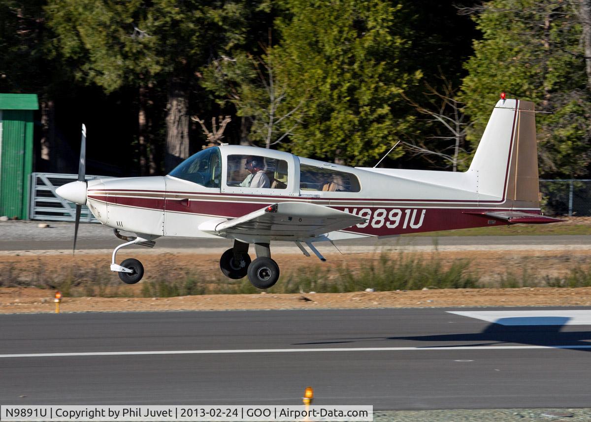 N9891U, Grumman American AA-5A Cheetah C/N AA5A0291, Taking off from Nevada County Air Park, Grass Valley, CA.