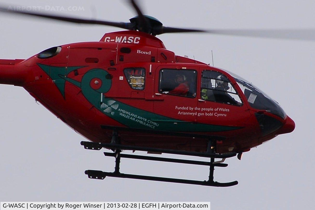 G-WASC, 2012 Eurocopter EC-135T-2+ C/N 1074, Mid-Wales Air Ambulance helicopter (Helimed 59) departing to it's base at Welshpool Airport after visiting to Swansea Airpoprt.