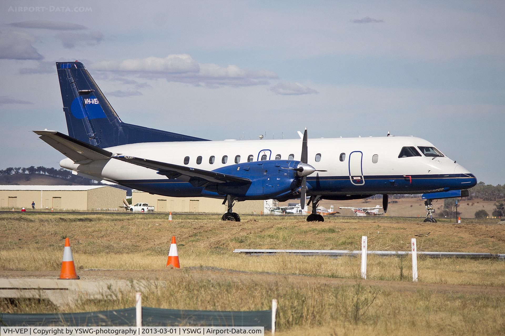 VH-VEP, 1995 Saab 340B C/N 340B-377, Vee H Aviation (VH-VEP) SAAB 340B, still in its former Calm Air livery, parked on the tarmac in the new general aviation area at Wagga Wagga Airport.