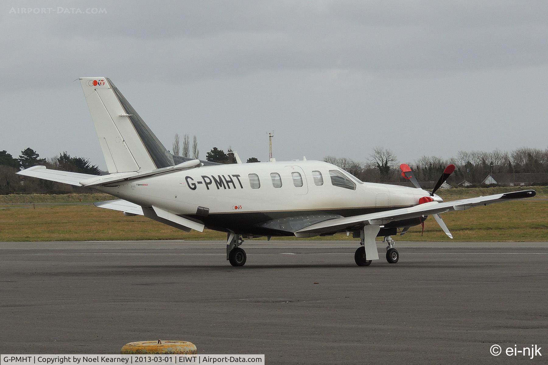 G-PMHT, 2008 Socata TBM-700N C/N 440, Parked on the apron at Weston.