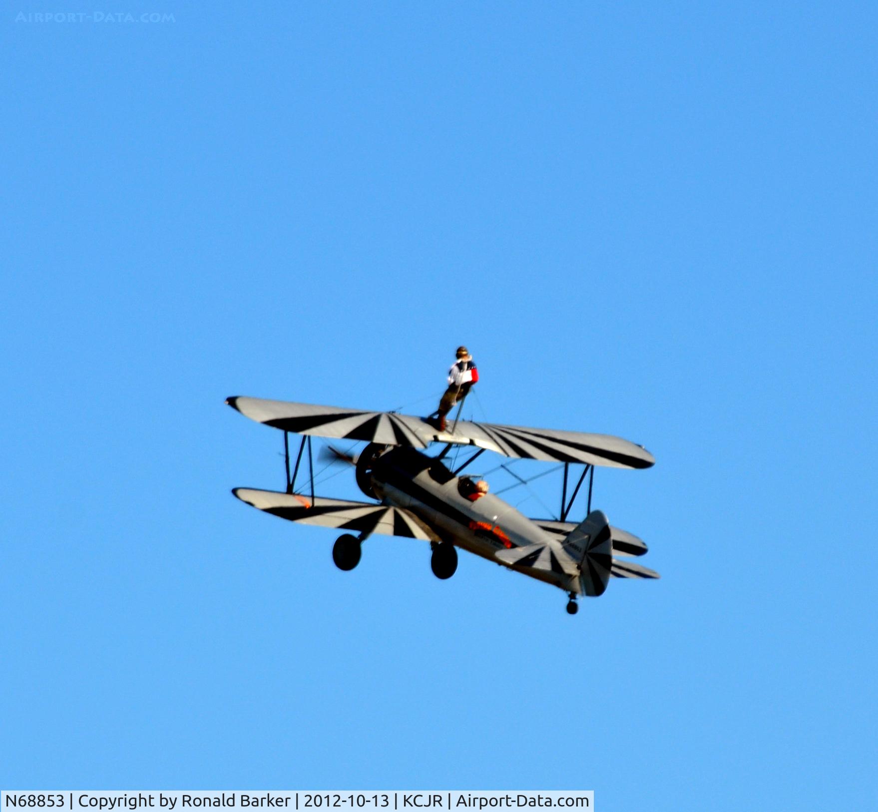 N68853, Boeing A75N1(PT17) C/N 75-5418, Wing walker - top of wing in climb - Flying Circus - Culpeper Air Fest 2012