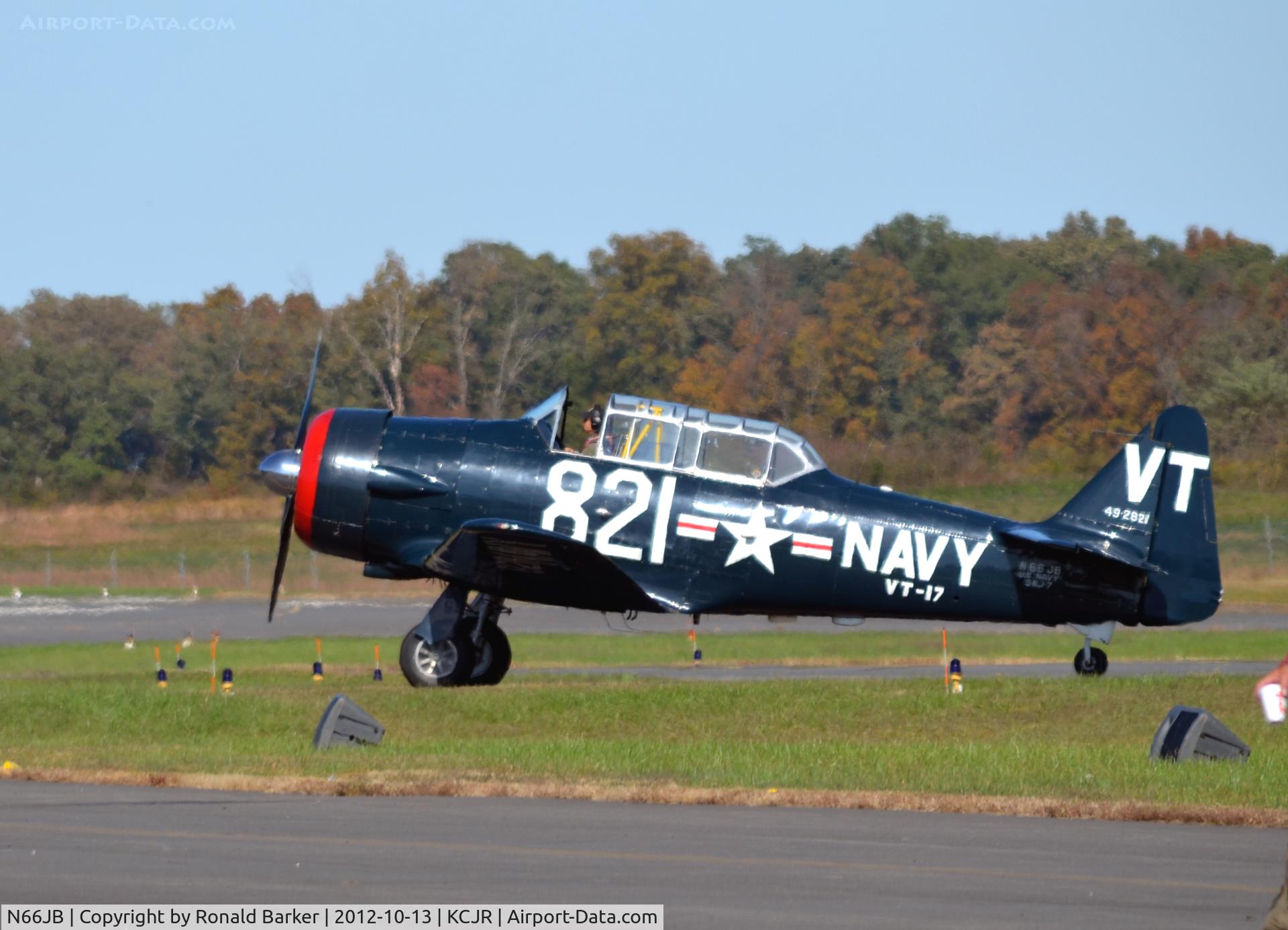 N66JB, 1949 North American T-6G Texan C/N 168-19, Taxi to parking - Culpeper Air Fest 2012