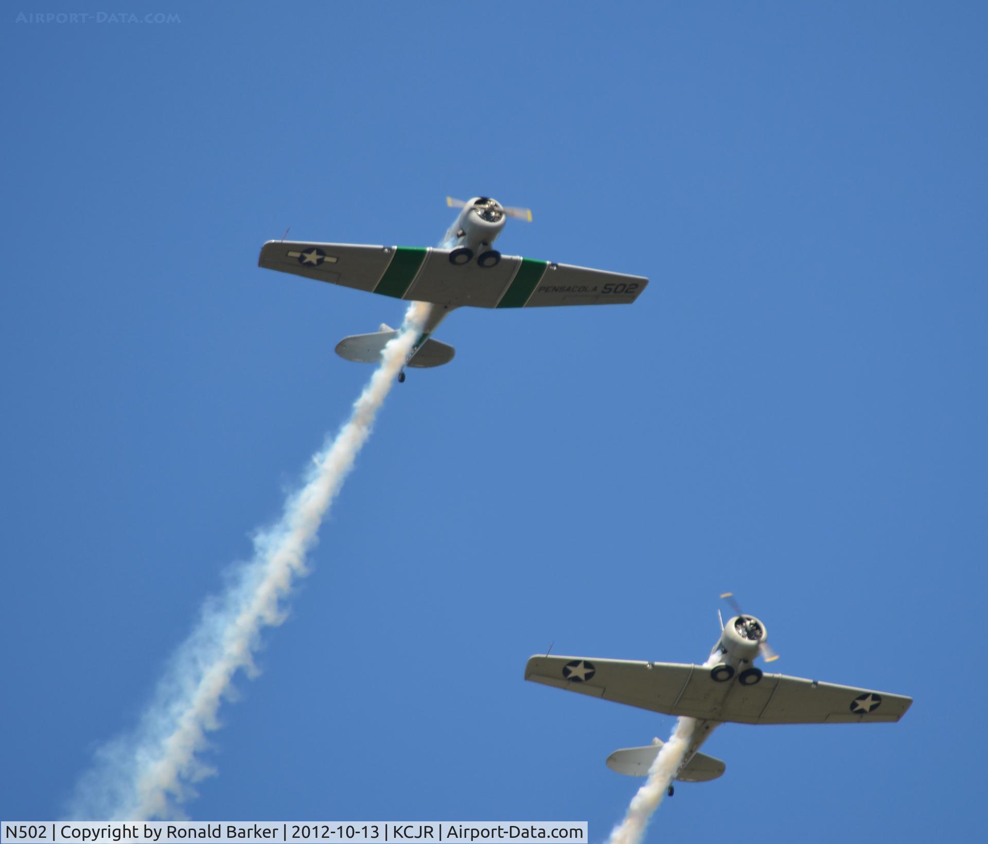 N502, 1941 North American SNJ-5 Texan Texan C/N 43689, N502 leading N9801C on the right - Culpeper Air Show 2012